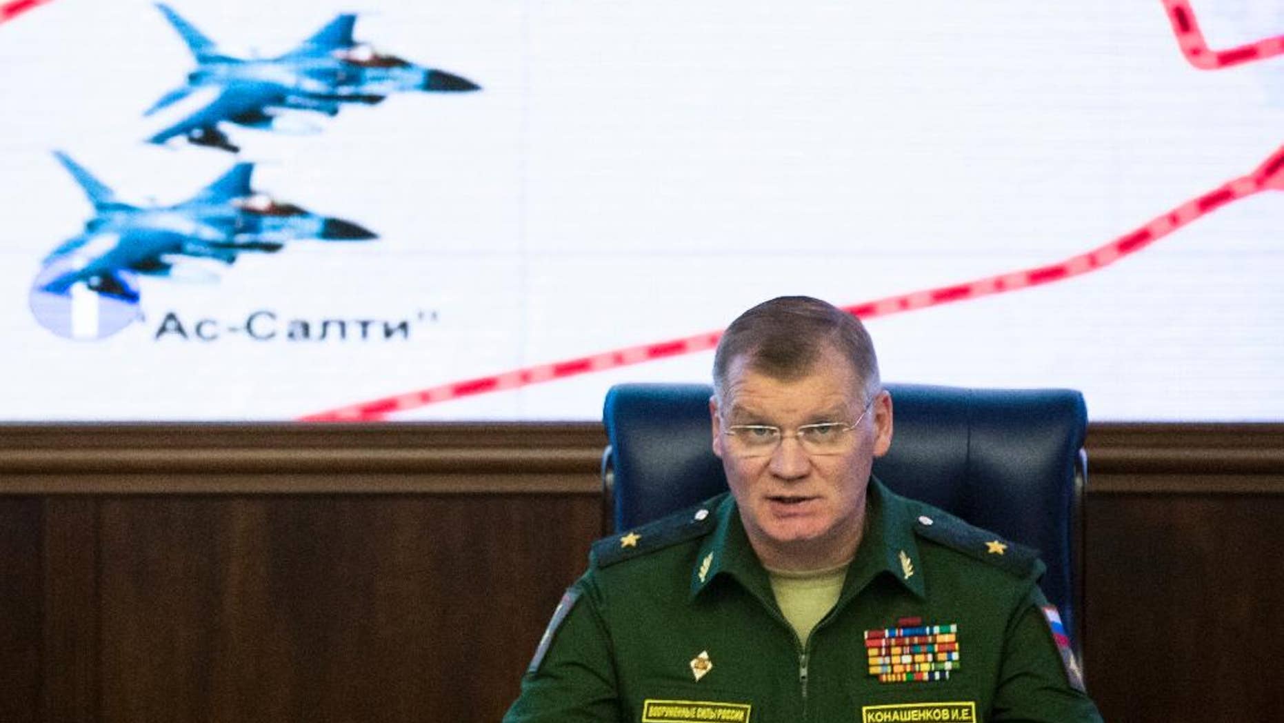 Russian Defense Ministry spokesman Maj. Gen. Igor Konashenkov speaks at a briefing in the Russian Defense Ministry's headquarters in Moscow, Russia, Thursday, Oct. 20, 2016. The Russian military is pressing its accusations against the U.S.-led coalition over a strike on a Syrian village. (AP Photo/Pavel Golovkin)