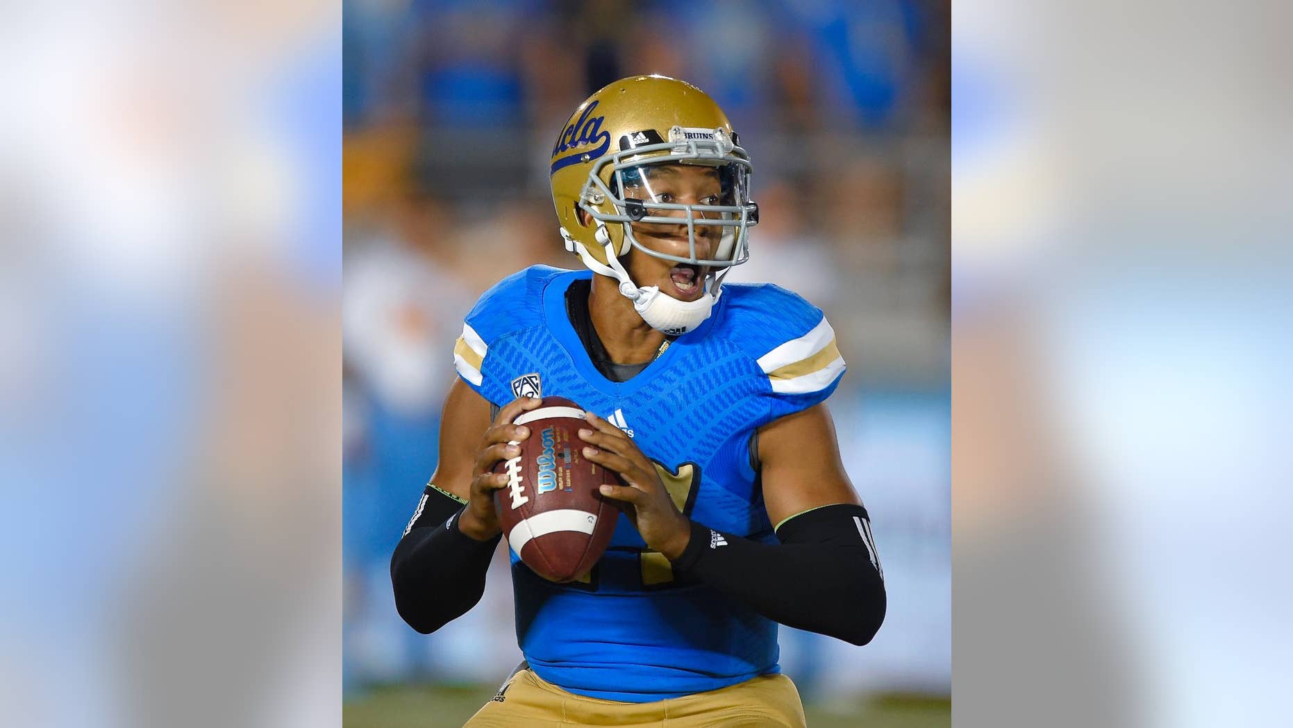 UCLA quarterback Brett Hundley passes the ball during the first half of an NCAA college football game against Memphis, Saturday, Sept. 6, 2014, in Pasadena, Calif. (AP Photo/Mark J. Terrill)