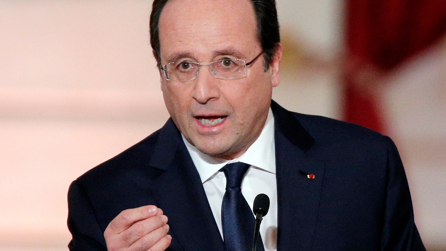 French President Francois Hollande delivers his speech at his annual news conference, Tuesday, Jan.14, 2014 at the Elysee Palace in Paris. The French president's complex personal life — and what it means to be the first lady in modern society — may get a full airing as Hollande answers questions for the first time since a tabloid reported he was having an affair with an actress. (AP Photo/Christophe Ena)