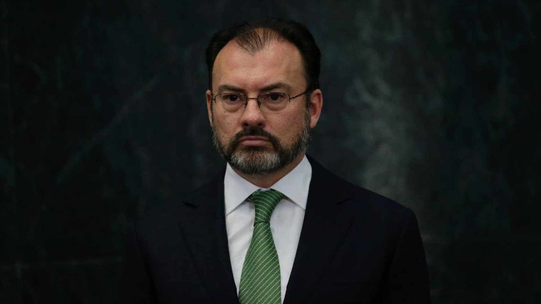 Mexico's new Foreign Relations Secretary Luis Videgaray stands during a press conference at the Los Pinos presidential residence in Mexico City, Wednesday, Jan. 4, 2017. Mexico's president has brought back Videgaray, a close adviser who resigned after arranging a meeting between Pena Nieto and then-presidential candidate Donald J. Trump. (AP Photo/Marco Ugarte)