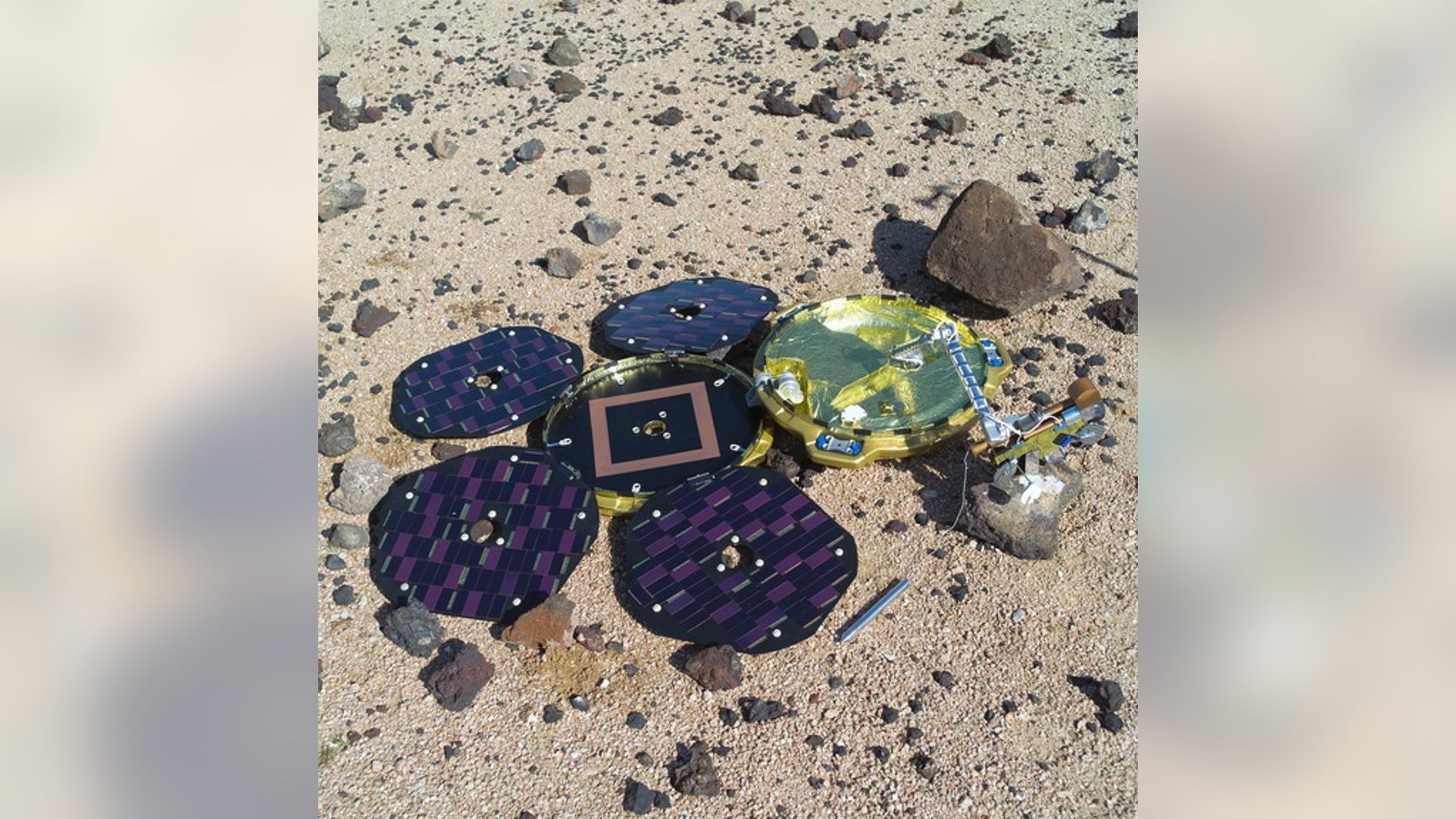 Model of the Beagle 2 lander on the Mars simulation surface at NASA's Johnson Space Center in Houston.