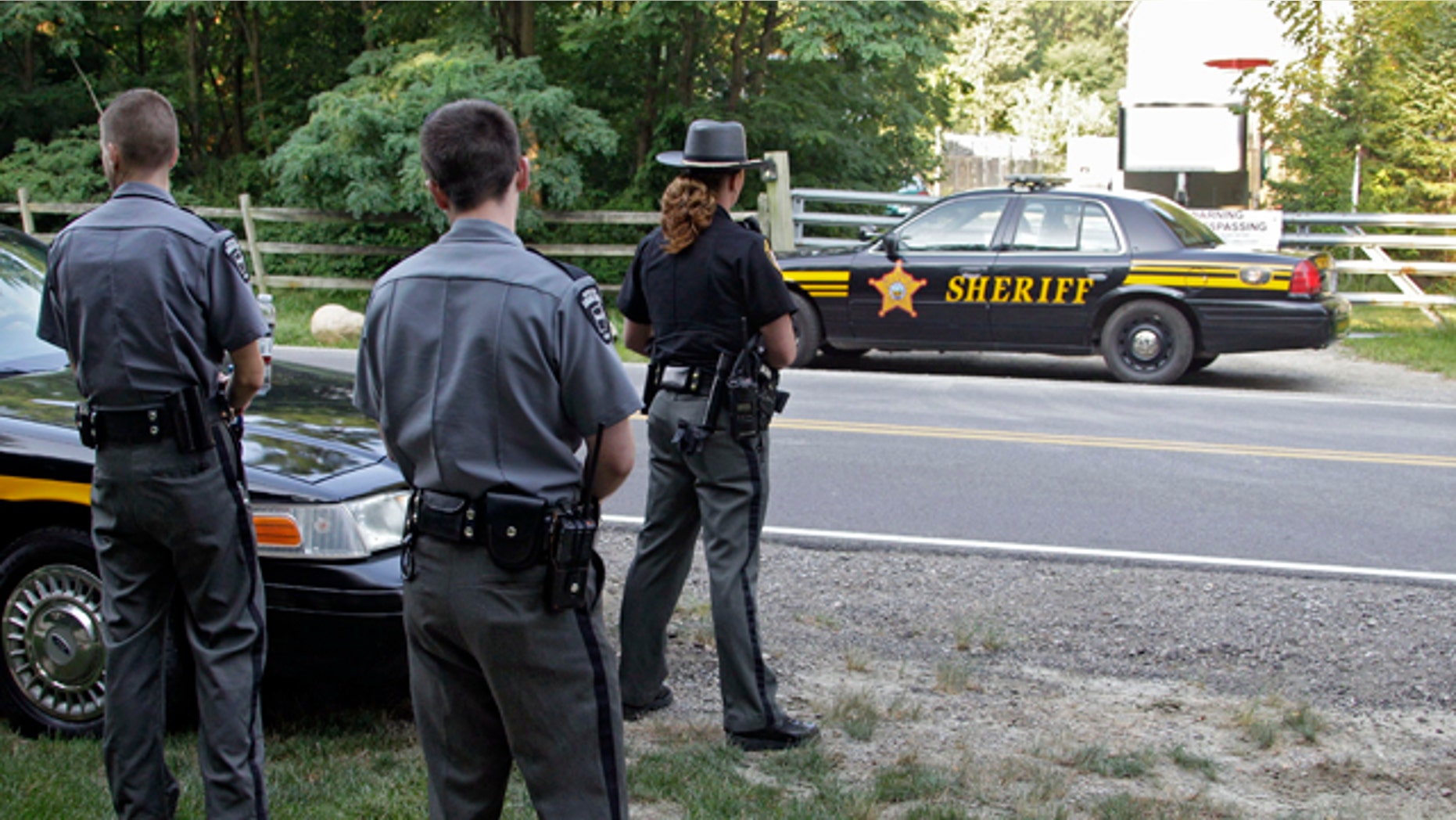 Aug. 20: Lorain County Sheriff's deputies secure an exotic animal farm in Columbia Station, Ohio, where a 24-year-old man was severely injured by a bear Thursday night.