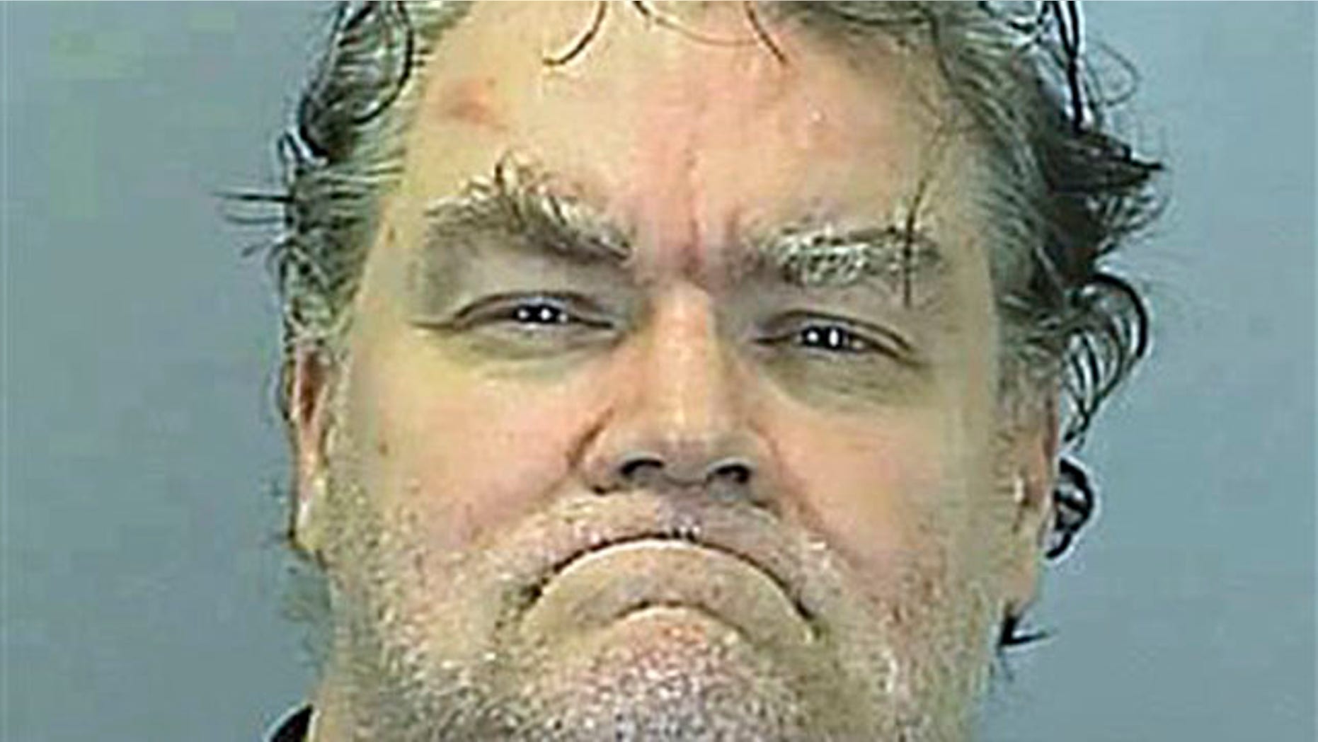 This undated photo provided by the Summit County Sheriff Department in Ohio shows Richard J. Beasley.