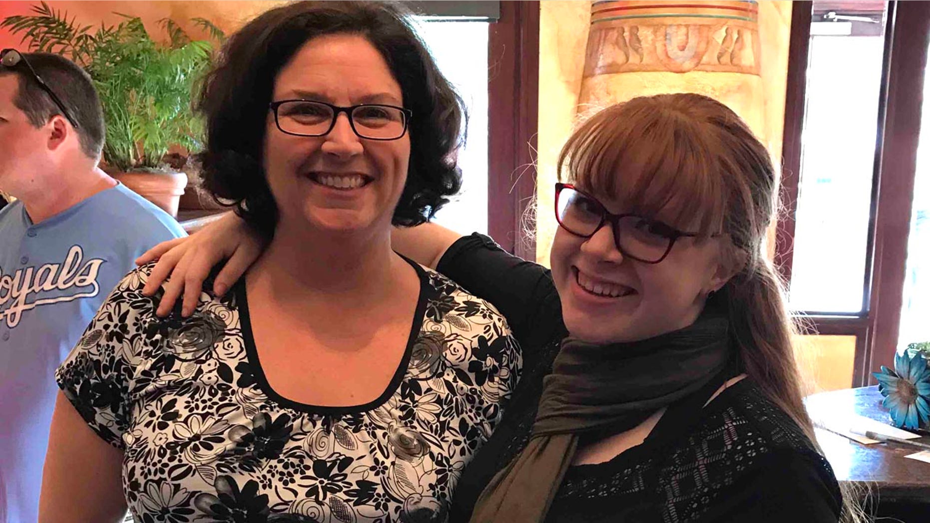 Janie Hall and Becca Bartholomew came to the unnamed man's rescue when he collapsed suddenly.