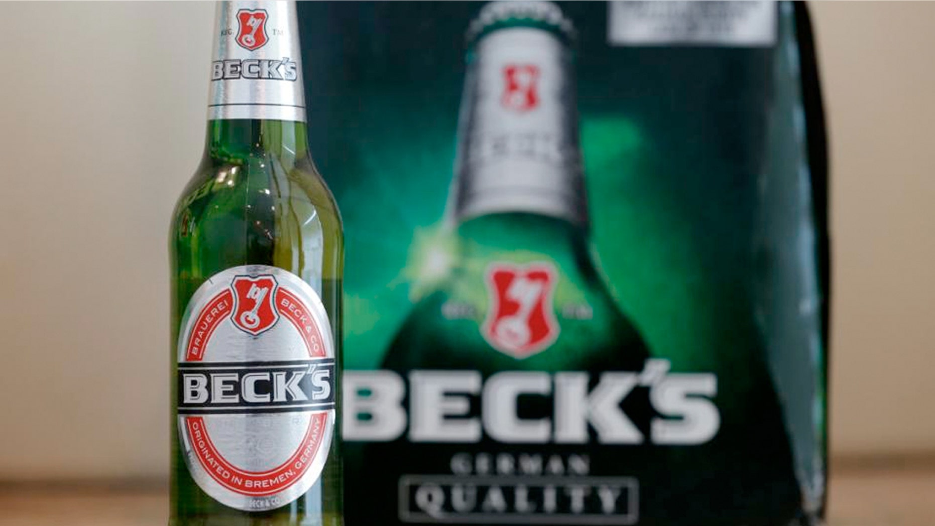 Anheuser-Busch, the company behind both Budweiser and Beck's, has agreed to settle a class-action lawsuit.