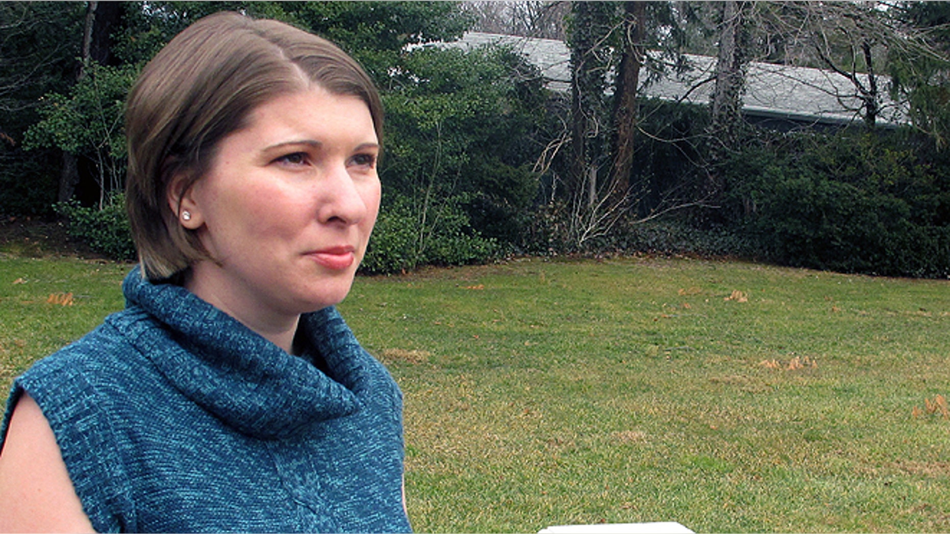 Jan. 14, 2013: Katie Beers, whose kidnapping as a 10-year-old girl attracted nationwide headlines in 1992, poses for a photo in Old Westbury, N.Y. John Esposito, convicted for kidnapping Beers and hiding her under his Bay Shore, N.Y. home for 17 days, died Wednesday at his jail cell in Sing Sing Correctional Facility in Ossining, N.Y. He was serving a 15 years-to-life prison term. (AP/Frank Eltman, File)