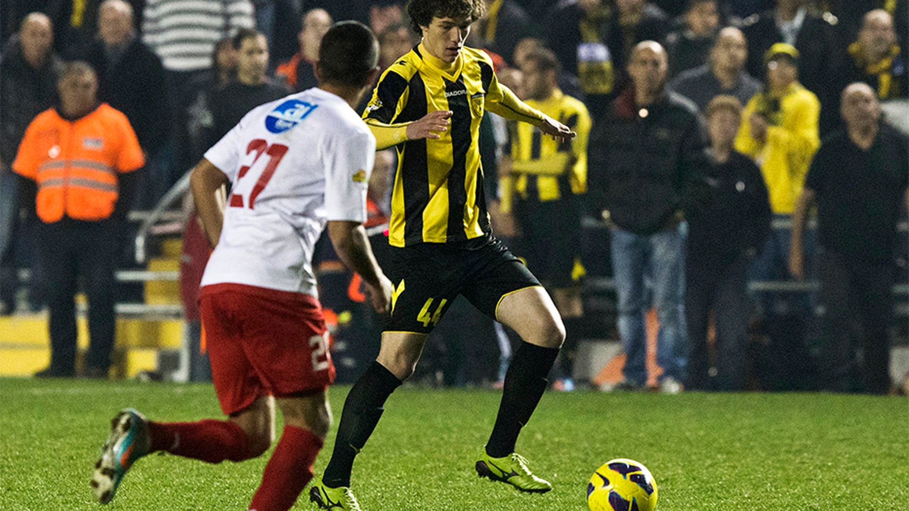 Feb. 10, 2013: Beitar Jerusalem's Dzhabrail Kadiyev, right, plays during a match against Bnei Sakhnin as part of the Israeli Premier League, at Teddy Stadium in Jerusalem.