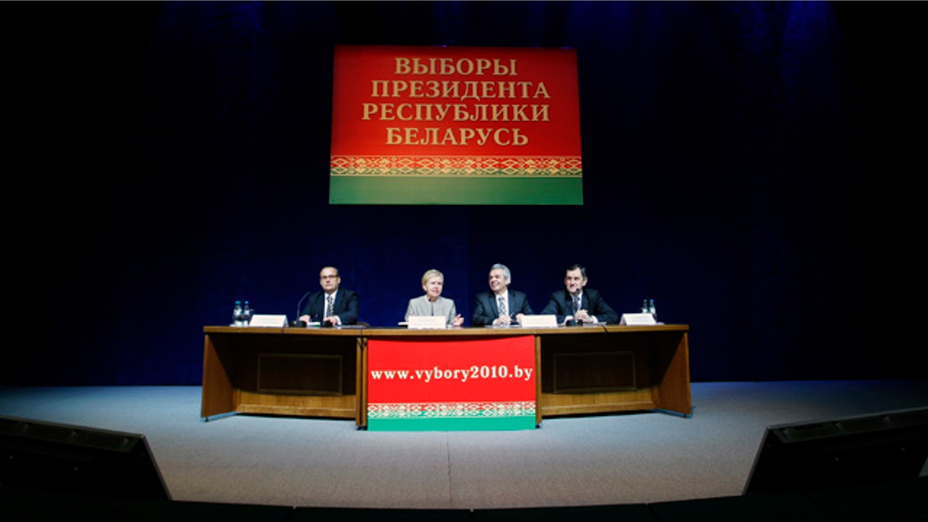 Dec. 20: Central Elections Commission Chairwoman Lidiya Ermoshina, second from left, speaks during a news conference in the Belarusian capital, Minsk. Belarus' President Alexander Lukashenko won a fourth term with nearly 80 percent of the vote, election officials said Monday, hours after truncheon-wielding riot police dispersed thousands of demonstrators who protested alleged vote fraud. (AP)
