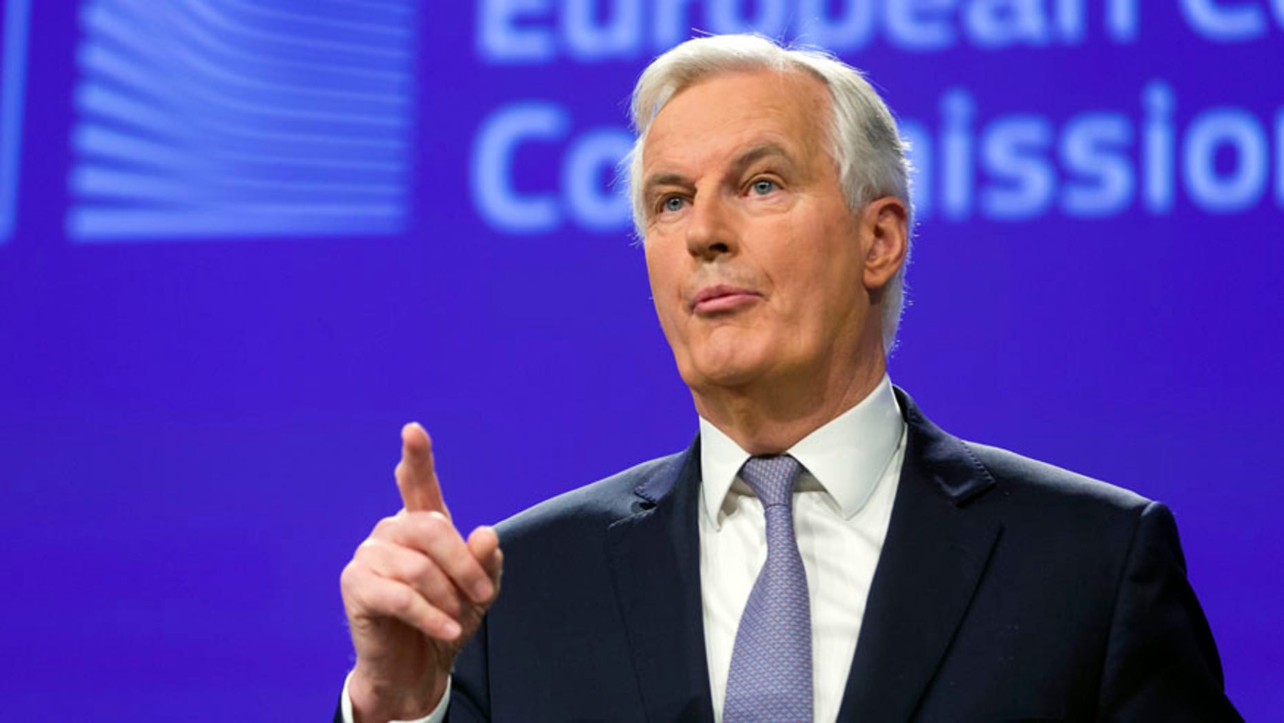 Michel Barnier, Chief Negotiator for the Preparation and Conduct of the Negotiations with the United Kingdom under Article 50 of the Treaty of the European Union, speaks during a media conference at EU headquarters in Brussels on Tuesday, Dec. 6, 2016. (AP Photo/Thierry Monasse)