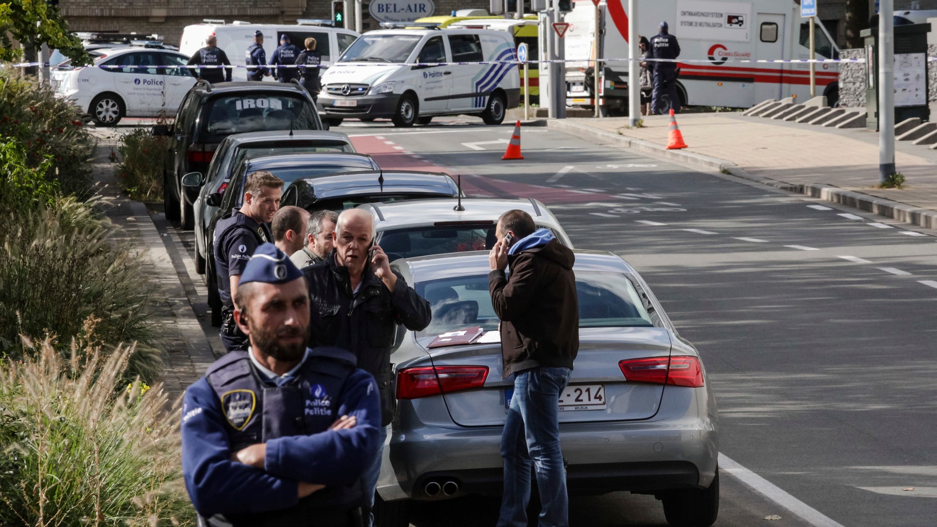 Police investigate the scene of a possible terror attack in Brussels.