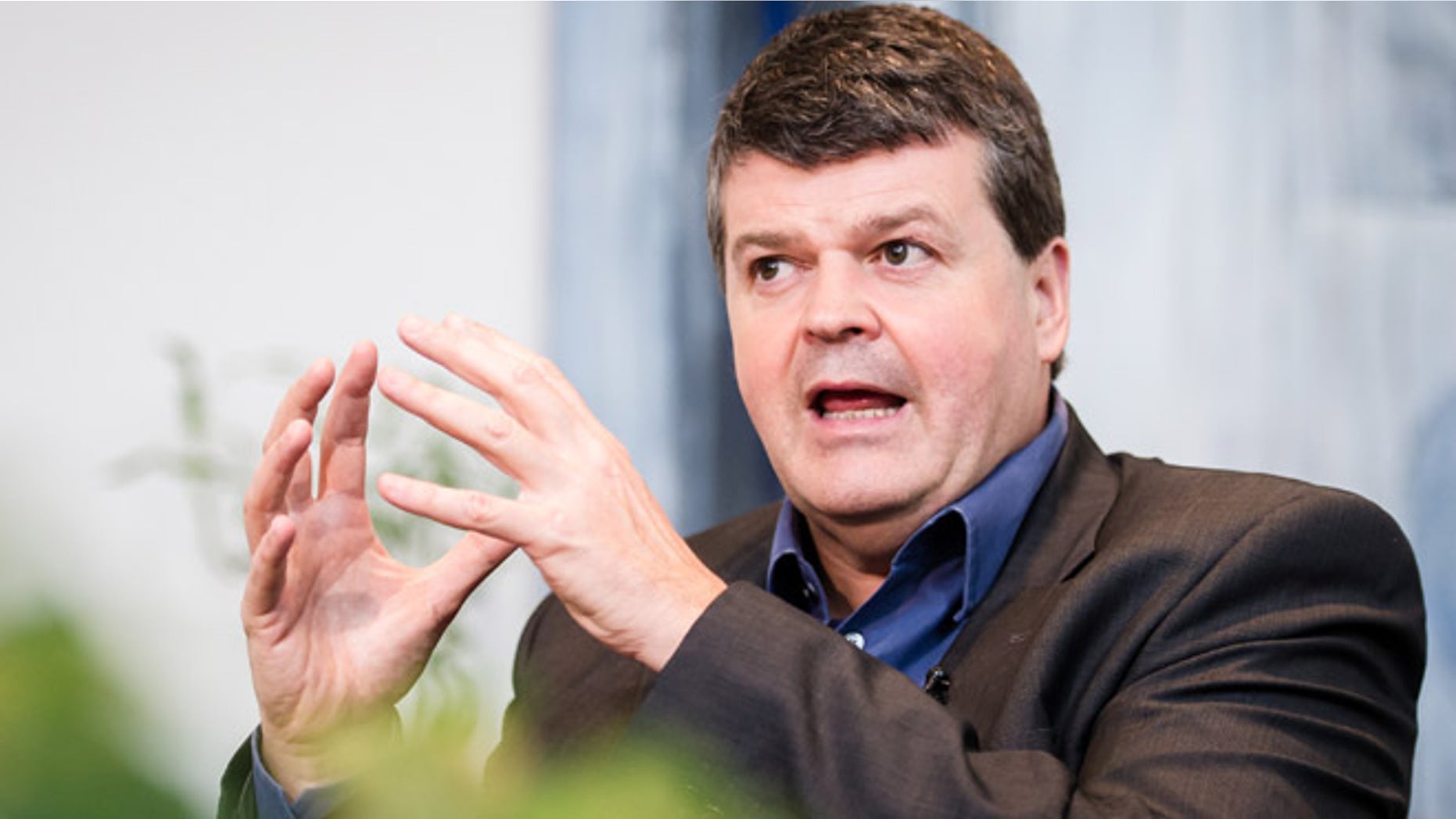 April 16, 2013: Mayor of Mechelen Bart Somers speaks to the Associated Press after early morning police raids took place in the city of Mechelen, Belgium. Belgian police have conducted early morning searches at numerous locations regarding the recruitment of fighters to help rebels trying to overthrow Syrian leader Bashar Assad.
