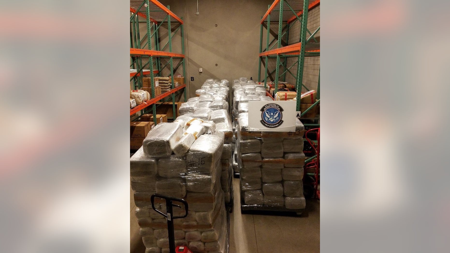 U.S. Customs and Border Protection officers in Nogales, Arizona, seized 13,700 pounds of marijuana, worth more than $6.8 million, that was hidden among bell peppers on a tractor trailer at the Mariposa Commercial Facility on Saturday, May 13, 2017 .