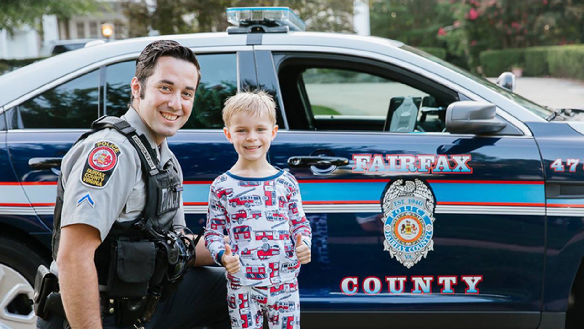 Officers posed with pictures with the boy, named Benjamin.