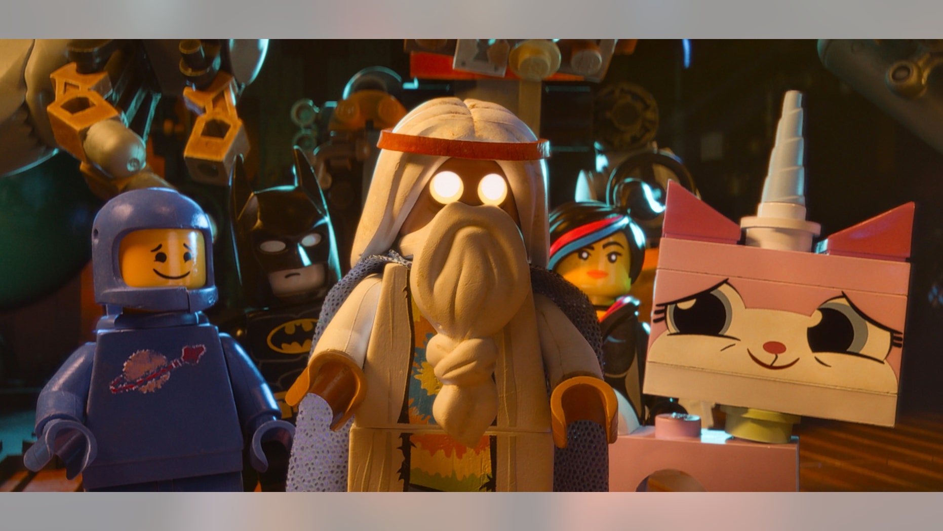 Benny, voiced by Charlie Day, Batman, voiced by Will Arnett, Vitruvius, voiced by Morgan Freeman, Wyldstyle, voiced by Elizabeth Banks and Unikitty, voiced by Alison Brie, in a scene from "The Lego Movie."