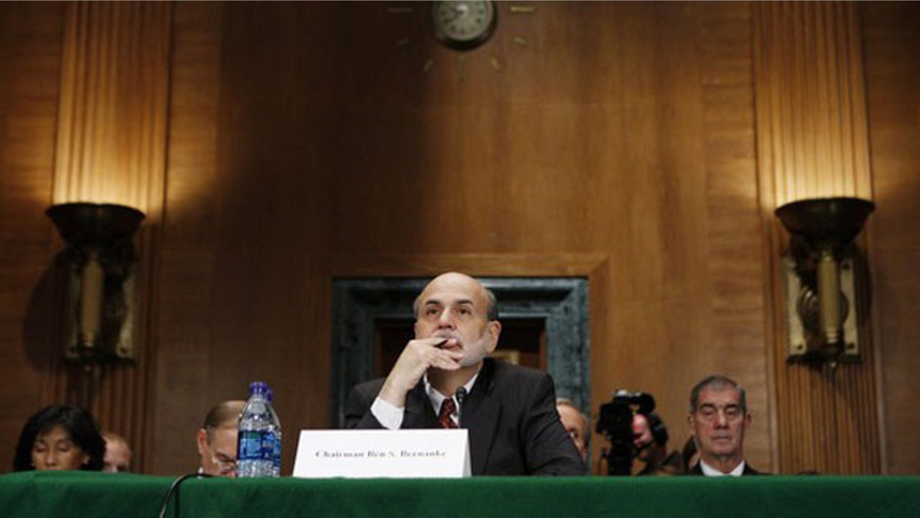 In this Sept. 2, 2010, photo, Federal Reserve Board Chairman Ben Bernanke listens to questioning at a Financial Crisis Inquiry Commission hearing in Washington.