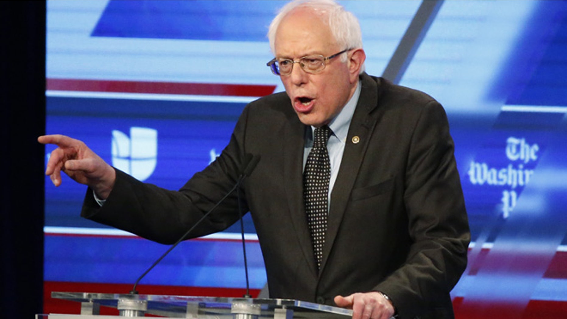 March 9, 2016: Sen. Bernie Sanders speaks at the Univision, Washington Post Democratic presidential debate at Miami-Dade College. His suit, though, was the main event. (AP)