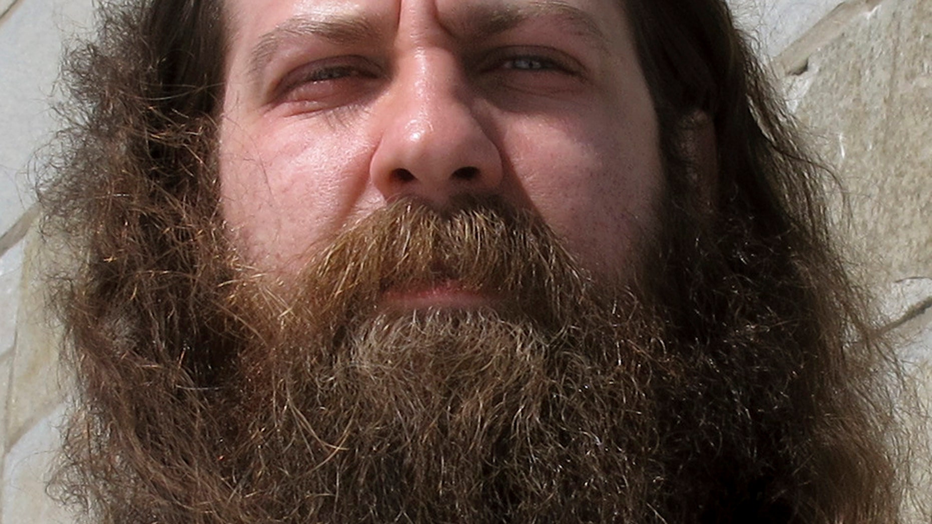 In this Friday, March 17, 2017 photo Bryan Sturge, of Barre, Vt., shows off his beard, in Montpelier, Vt., that he has entered into the "Vermont Beardies" competition.