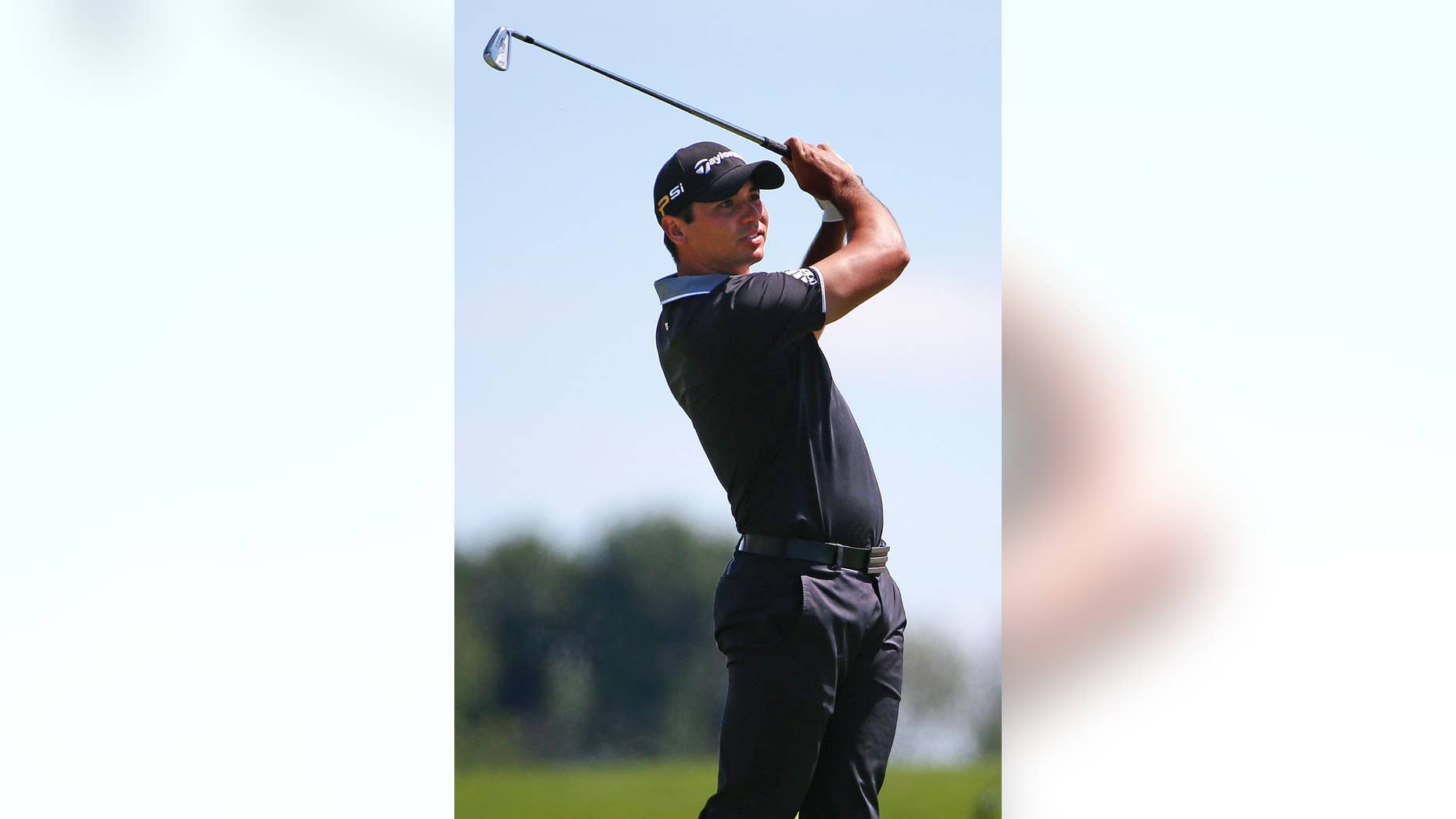 Jason Day, of Australia, hits his approach shot to the 18th green during a practice round for the 2016 US Open golf championship at Oakmont Country Club in Oakmont, Pa., Monday, June 13, 2016. (AP Photo/Gene J. Puskar)