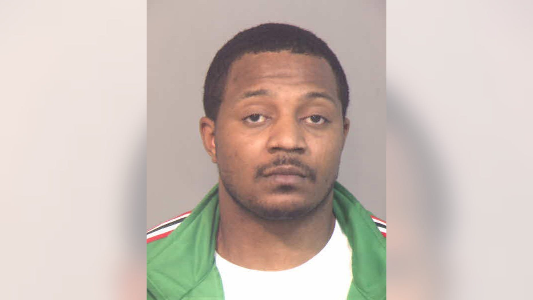 This undated handout photo provided by the Anne Arundel County Police Department shows Tavon White, who prosecutors say oversaw a drug smuggling operation inside the Baltimore City Detention Center and used contraband cellphones to direct gang activity on the streets. White is scheduled to be sentenced in federal court in Baltimore, Monday, Feb. 9, 2015, after pleading guilty to participating in the racketeering conspiracy. (AP Photo/Anne Arundel County Police Department)