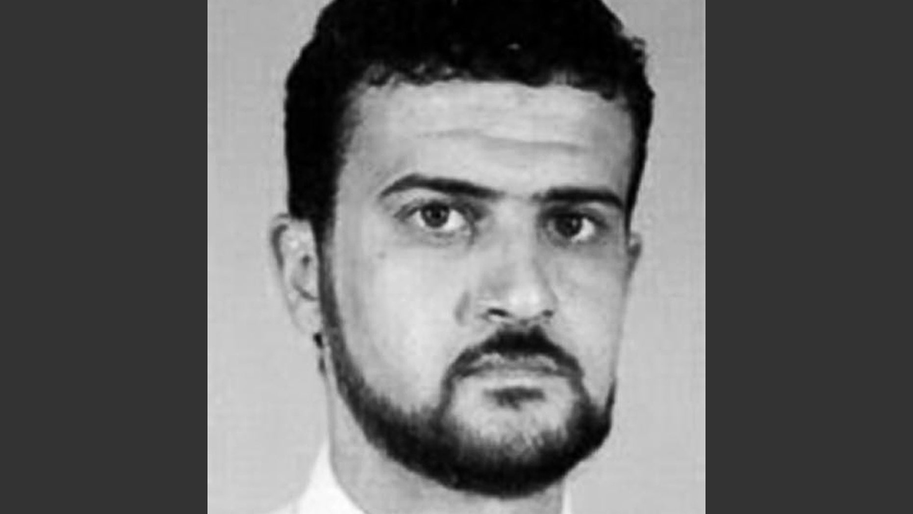FILE - This file image from the FBI website shows Abu Anas al-Libi, an al-Qaeda leader connected to the 1998 embassy bombings in eastern Africa and wanted by the United States for more than a decade. Al-Libi was captured in a raid Saturday, Oct. 5, 2013, and is being held aboard the USS San Antonio, a warship mainly used to transport troops. Instead of sending suspected terrorists to Guantanamo Bay or secret CIA "black" sites for interrogation, the Obama administration is questioning them aboard U.S. naval vessels. (AP Photo/FBI, File)