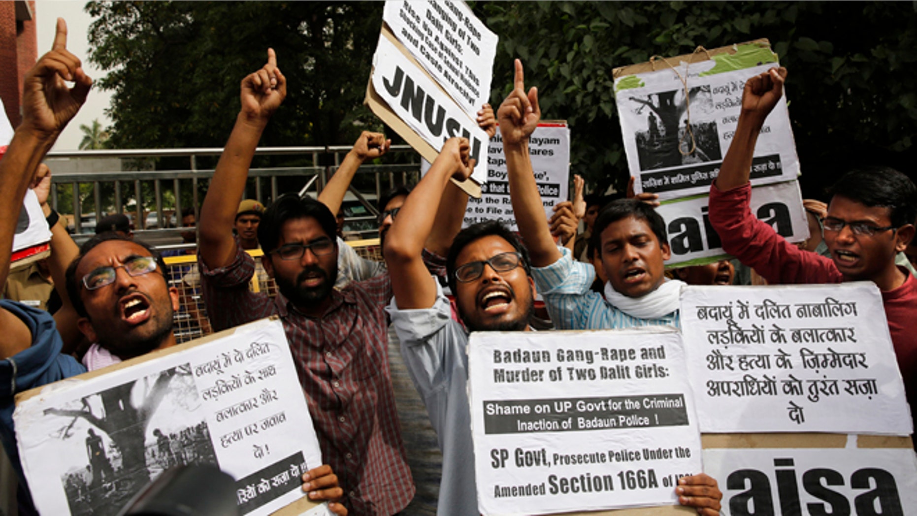 May 30, 2014: Members of Jawaharlal Nehru University Students Union shout slogans during a protest against a gang rape of two teenage girls in Katra village, outside the Uttar Pradesh state house, in New Delhi, India.