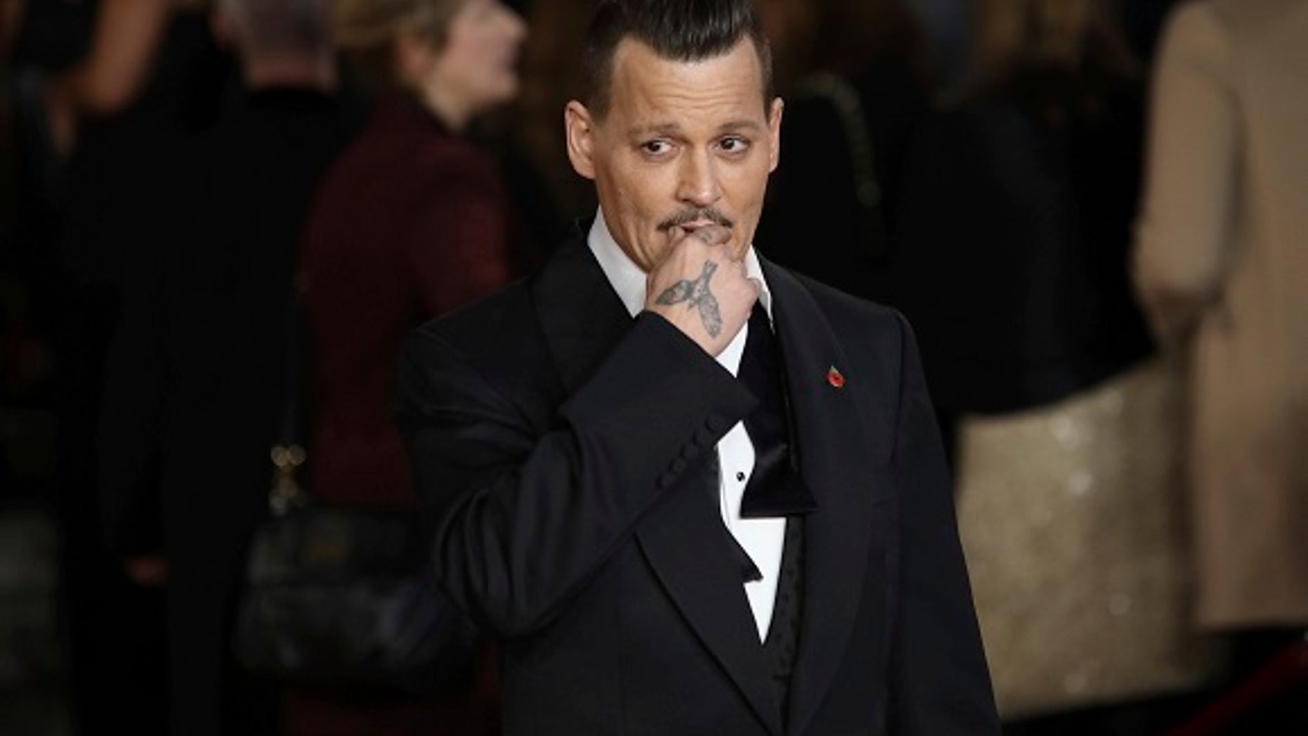 Johnny Depp’s former managers want to foreclose the actor’s five Los Angeles properties to pay back a $5 million loan they took out for him.