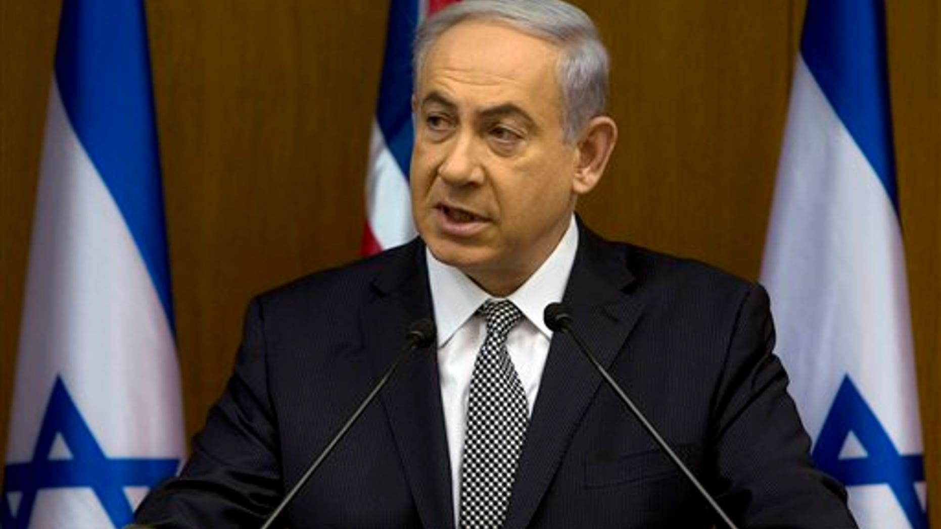 July 24, 2014: Israeli Prime Minister Benjamin Netanyahu speaks during joint statements with British Foreign Secretary Philip Hammond at the Knesset, Israel's parliament in Jerusalem.