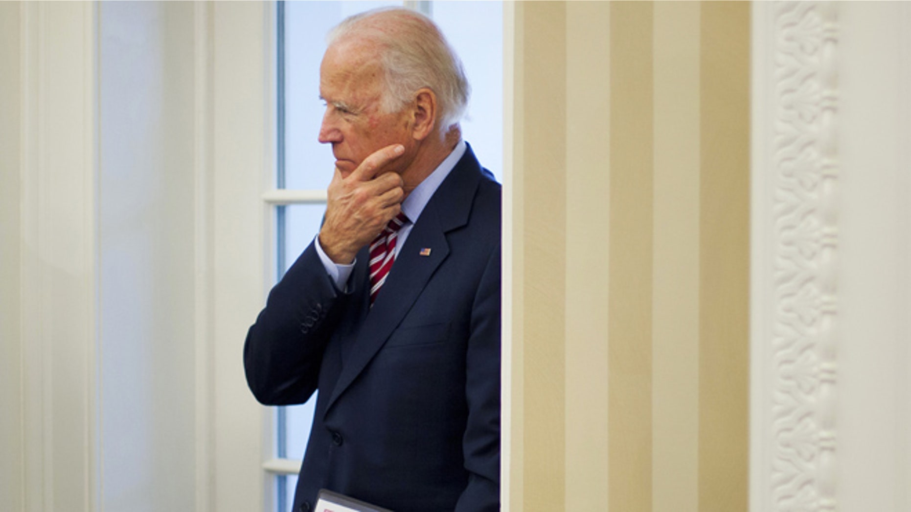 May 26, 2015: Vice President Joe Biden listens to remarks to the media during a meeting between President Barack Obama and NATO Secretary General Jens Stoltenberg in the Oval Office of the White House in Washington. (AP)