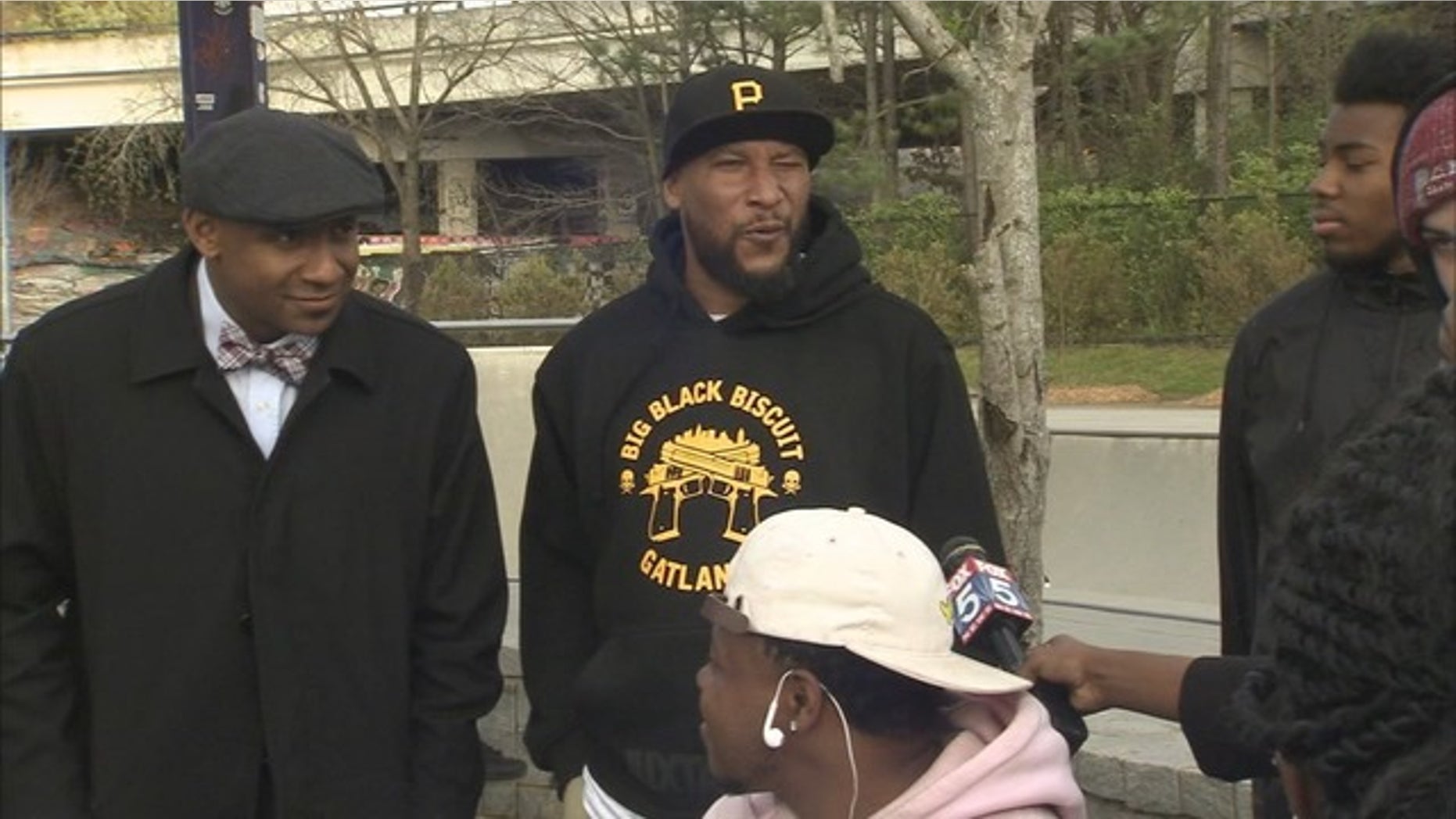 The man was claiming his shirt's gun logo got him kicked off a flight.