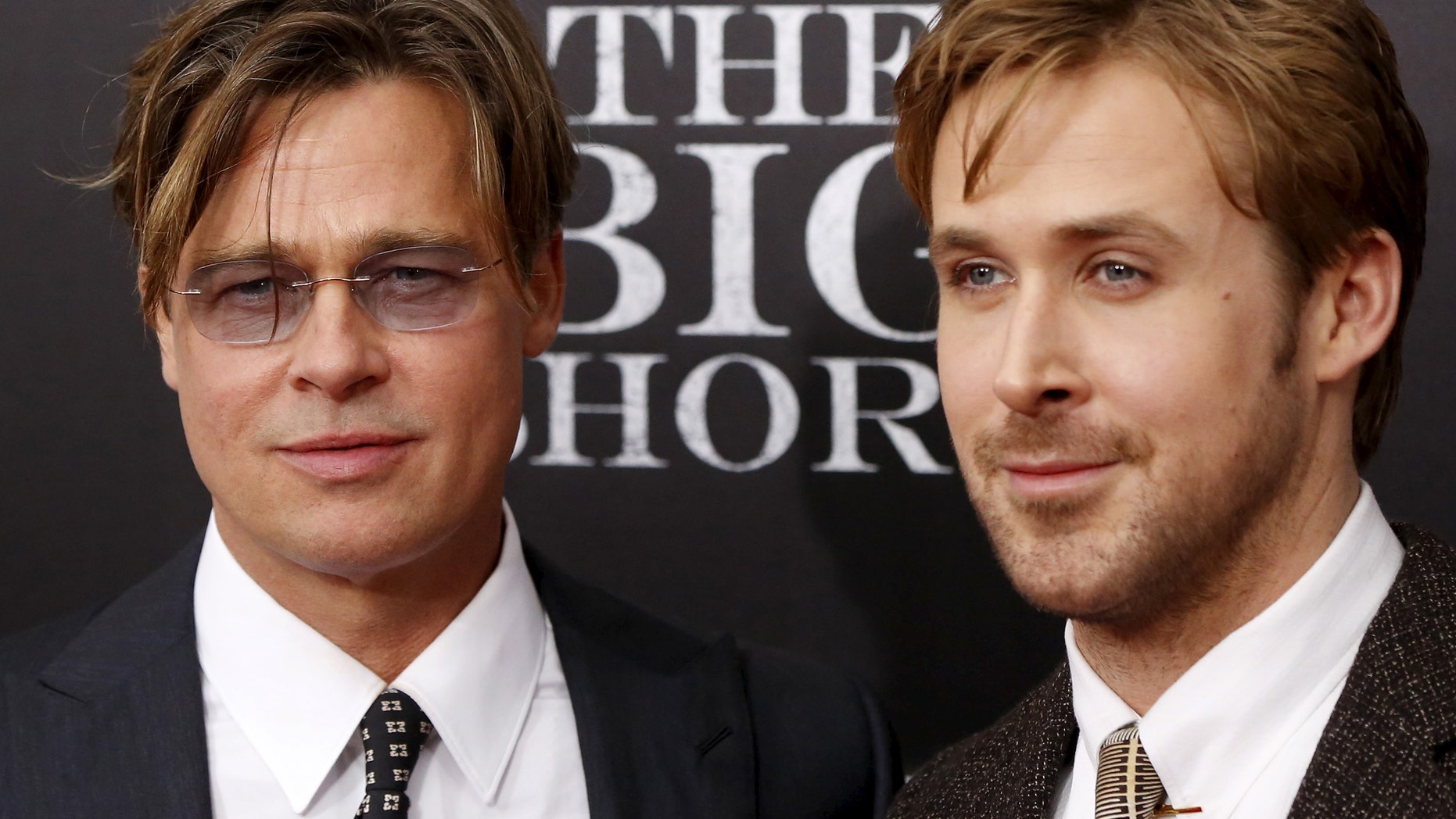 Cast members Brad Pitt and Ryan Gosling pose on the red carpet at the premiere of "The Big Short" in New York November 23, 2015. REUTERS/Shannon Stapleton - RTX1VIWN
