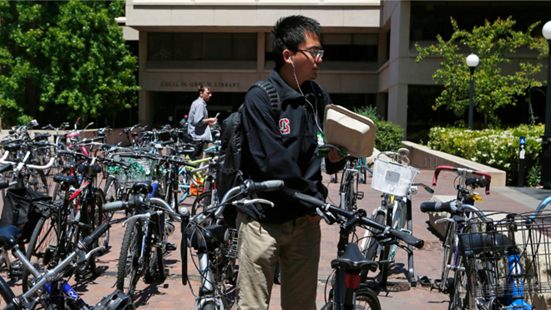 May 9, 2014: Students navigate a bicycle parking lot at Stanford University in Stanford, Calif.