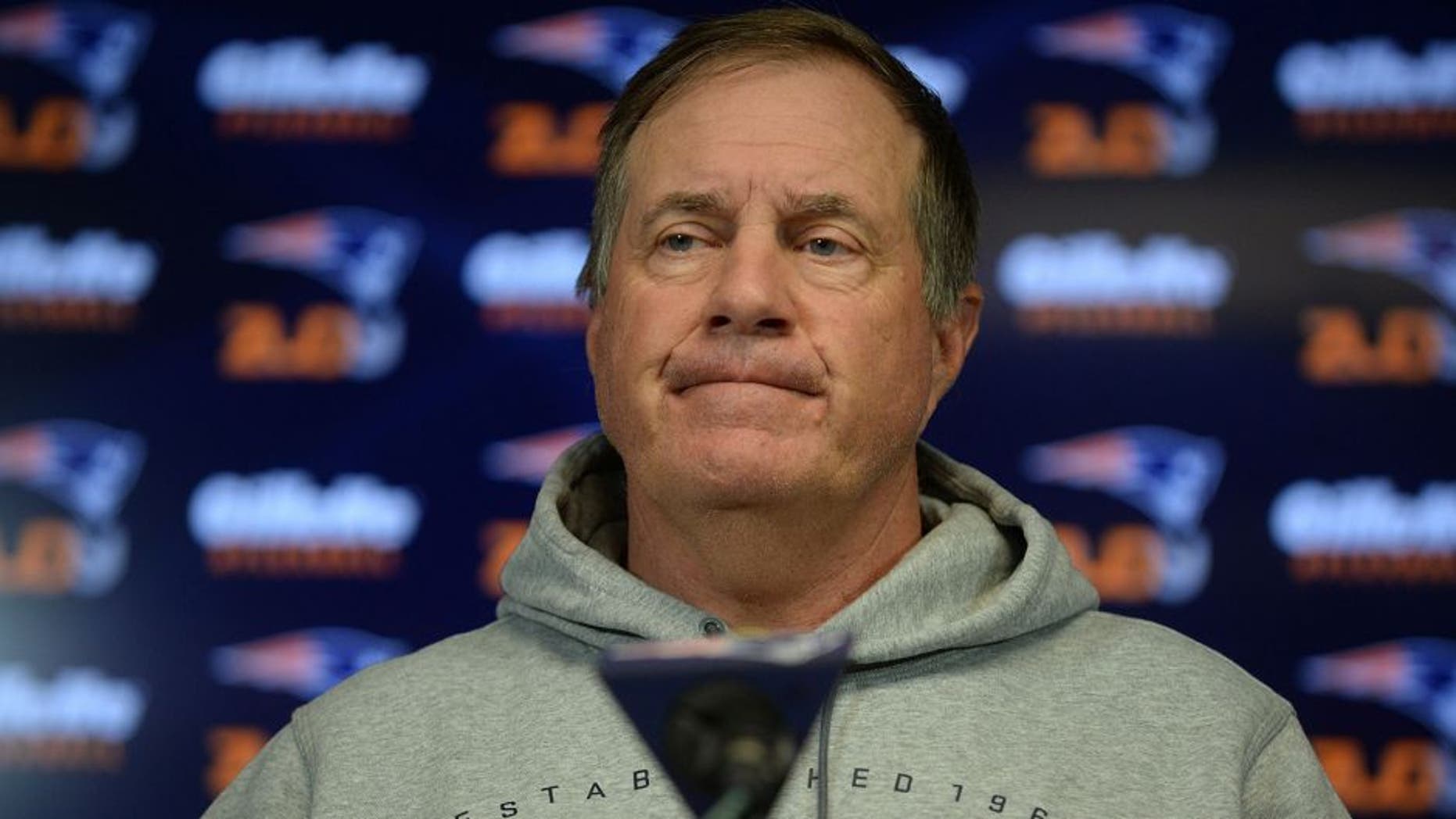 FOXBOROUGH, MA - JULY 29: New England Patriots head coach Bill Belichick speaks at a press conference at Gillette Stadium July 29, 2015 in Foxborough, Massachusetts. Belichick was asked about NFL Commissioner Roger Goodell's decision to uphold a four game suspension for quarterback Tom Brady for his role in using underinflated balls in the AFC Championship game in 2014. (Photo by Darren McCollester/Getty Images)