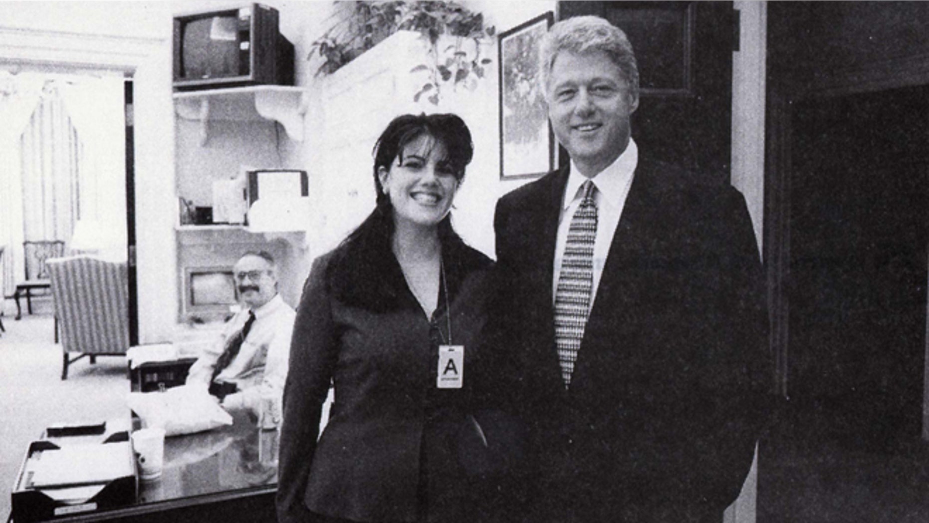 In this Nov. 17, 1995 file photo, President Clinton poses with Monica Lewinsky.