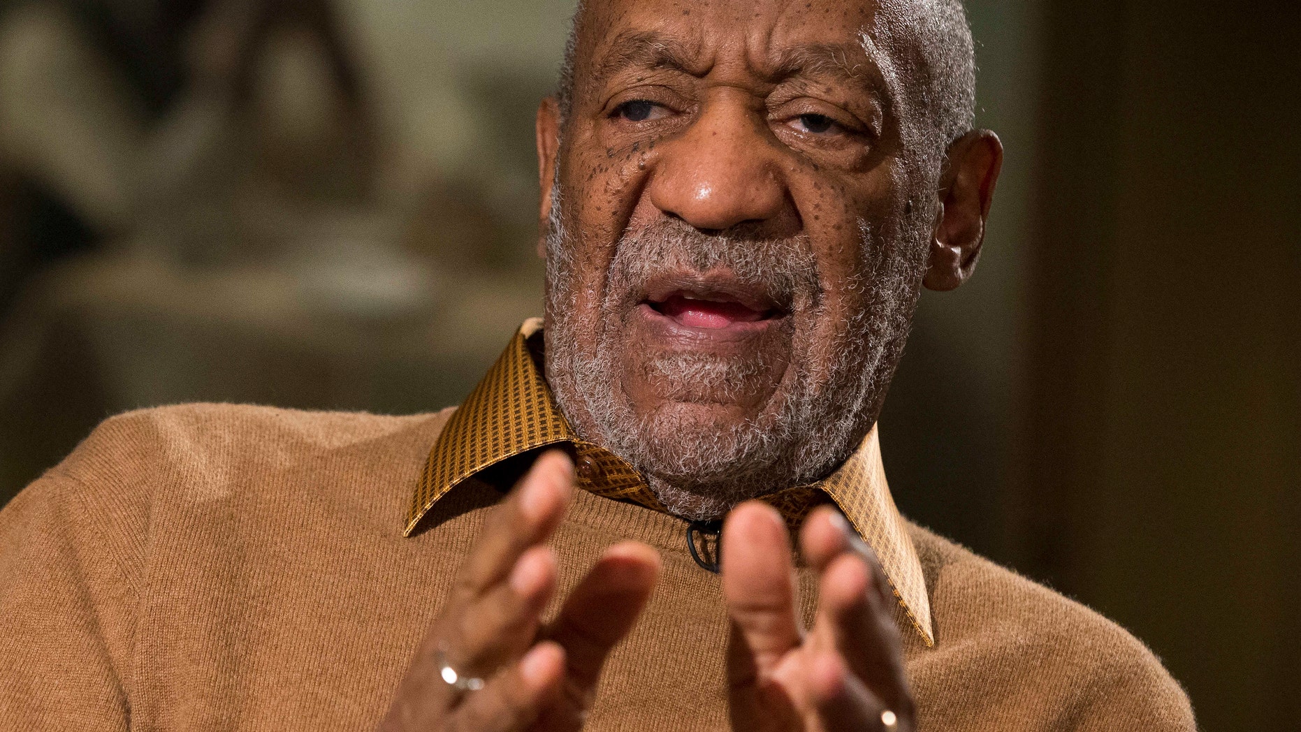 Nov. 6, 2014. Bill Cosby gestures during an interview about the upcoming exhibit, "Conversations: African and African-American Artworks in Dialogue," at the Smithsonian's National Museum of African Art, in Washington.