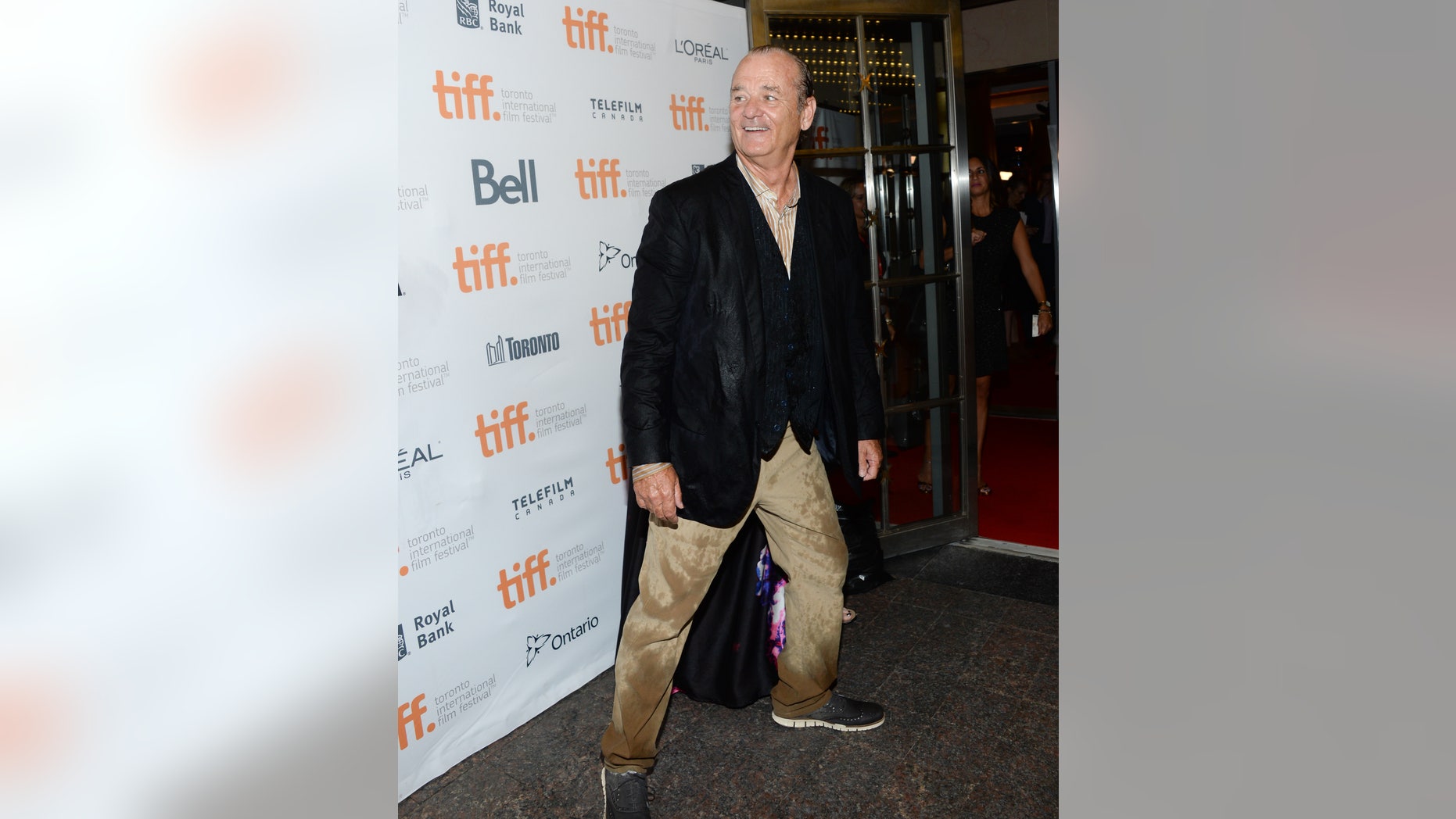 September 5, 2014. A drenched Bill Murray arrives at the "St. Vincent" premiere during the Toronto International Film Festival on Friday, Sept. 5, 2014, in Toronto.