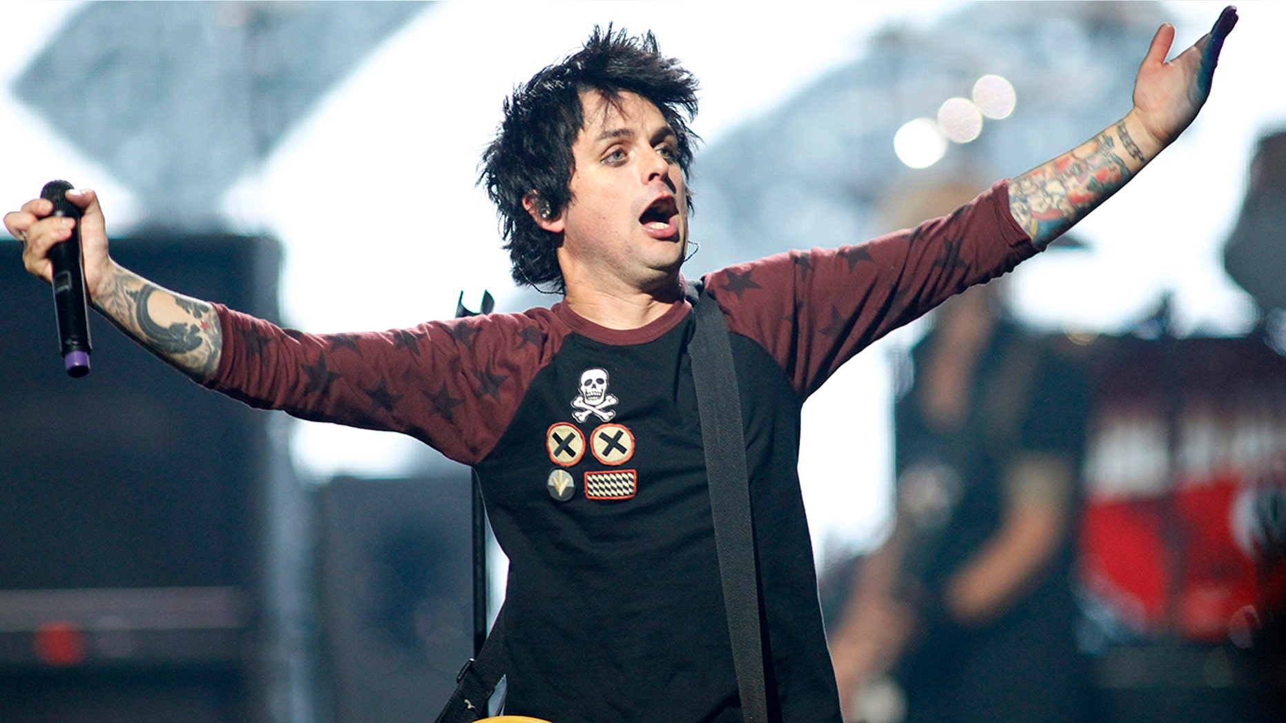 Green Day lead vocalist and guitarist Billie Joe Armstrong performs with the group during the 2012 iHeart Radio Music Festival in Las Vegas, Nevada September 21, 2012.