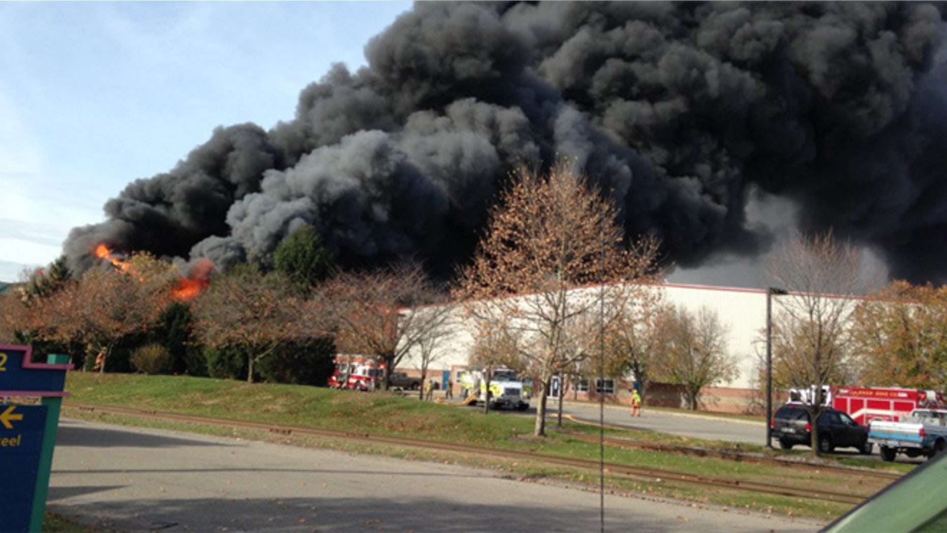 Smoke can be seen billowing from the scene of a fire in Leetsdale, Pa. The town is outside Pittsburgh.