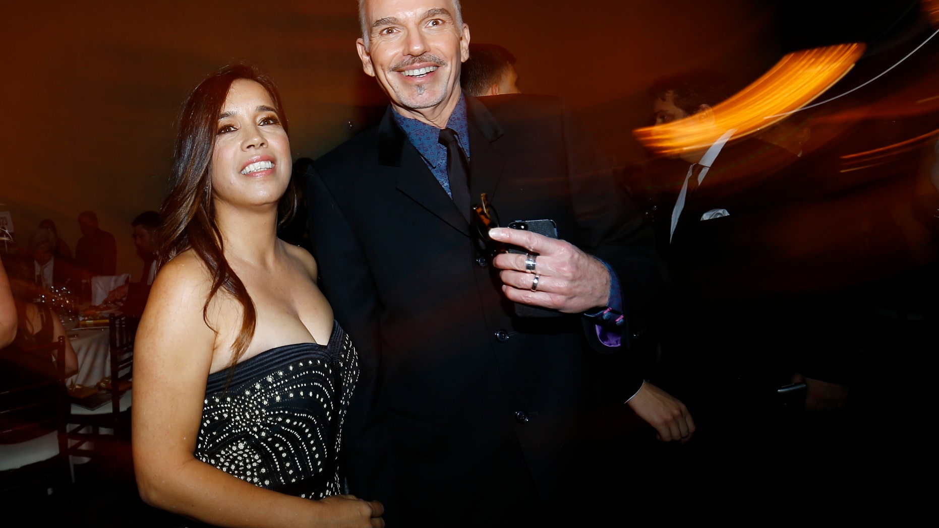 January 11, 2015. Actor Billy Bob Thorton arrives with Connie Angland at the 72nd Golden Globe Awards in Beverly Hills, California.
