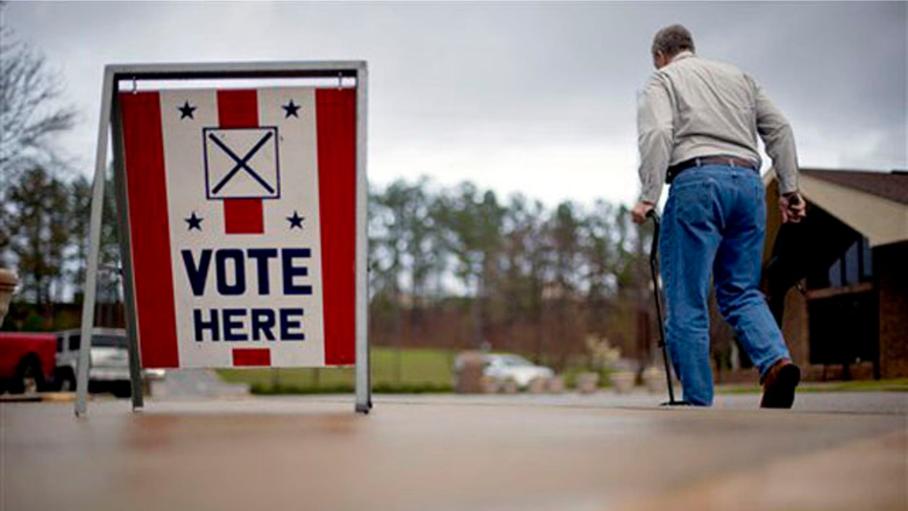 A voter leaves a polling place in Birmingham, Ala. in 2012