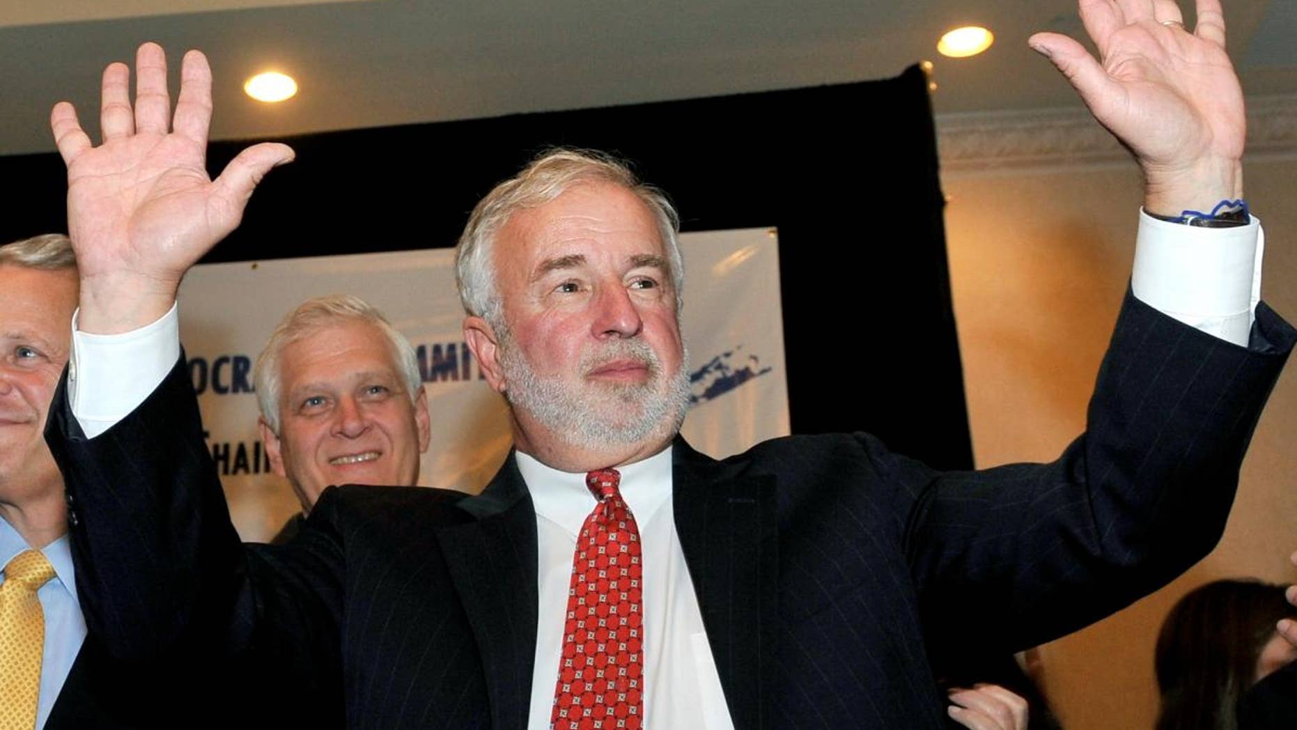 Rep. Tim Bishop waves to supporters at the Islandia Marriott on Tuesday, Nov. 2, 2010, in Islandia, N.Y. (AP Photo/Kathy Kmonicek)