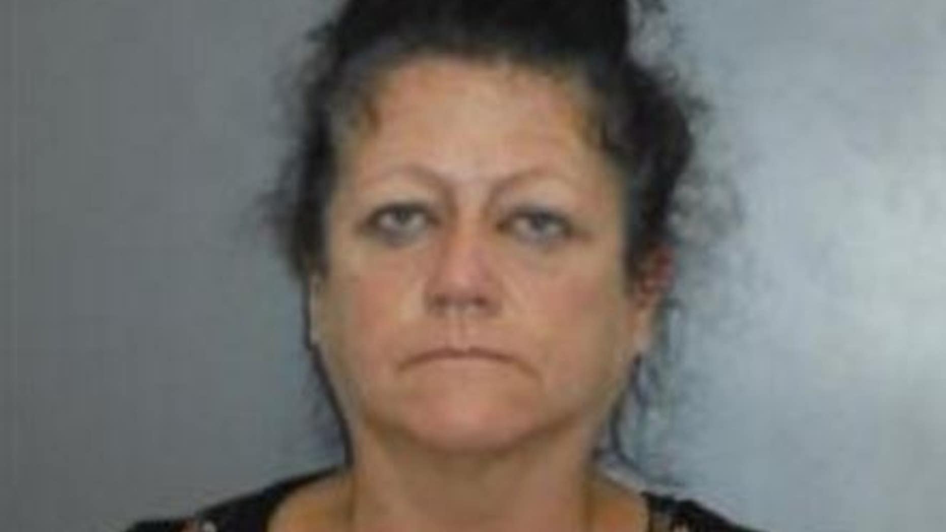 Jennifer Lea Collins, 55, is a caretaker in Arkansas accused of biting an elderly woman to death now facing murder charges.