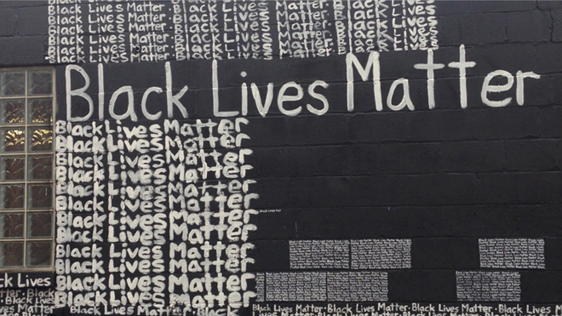 Friday, Sept. 18, 2015: A Black Lives Matter mural behind the Namdi Center for Contemporary Art, in Detroit, Mich.