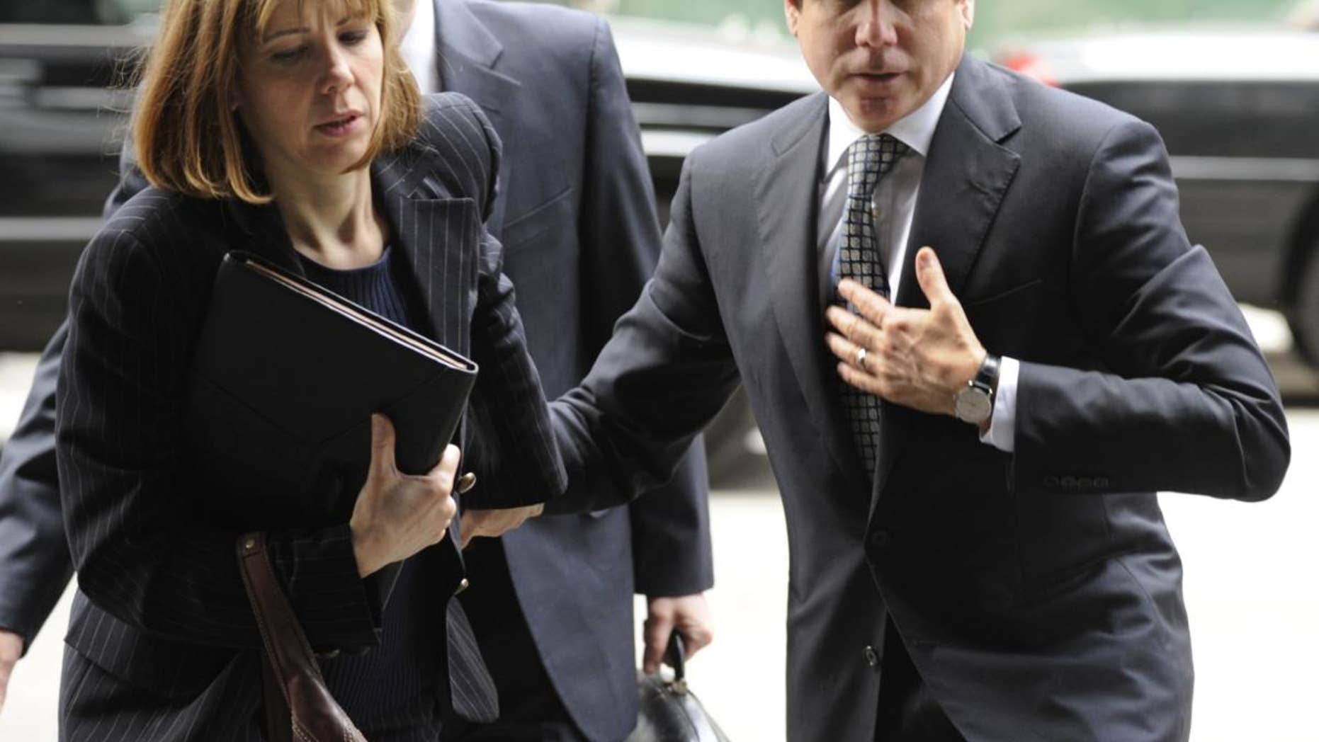 Former Illinois Gov. Rod Blagojevich and his wife Patti Blagojevich arrive at federal court for final jury selection and opening arguments in his second corruption trial, Monday, May 2, 2011, in Chicago. (AP Photo/Paul Beaty)