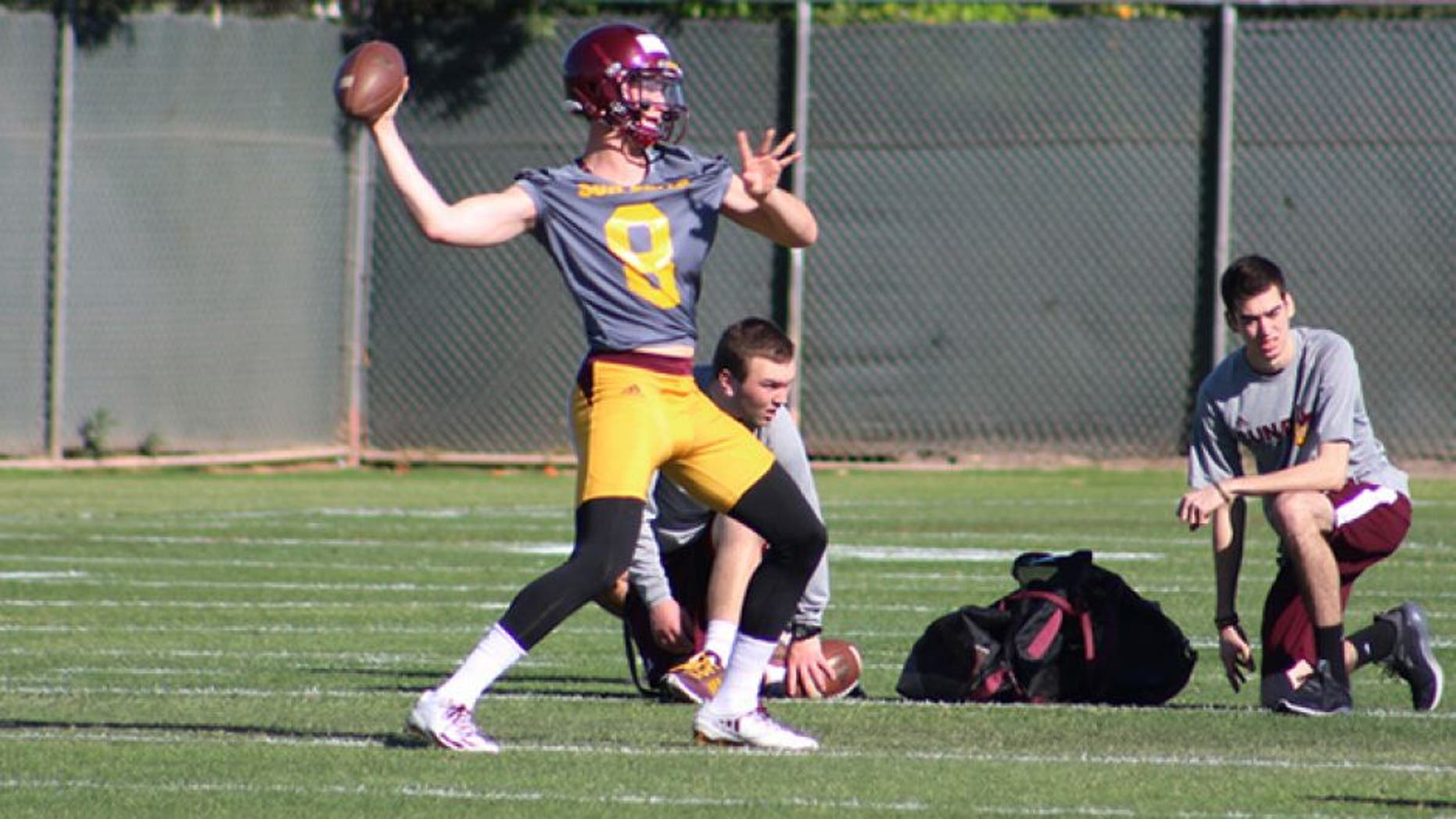 Arizona State University quarterback Blake Barnett pulls back for the throw during spring workouts on Tuesday, March 14, 2017, in Tempe, Ariz. (Photo by Tyler Drake/ Cronkite News)