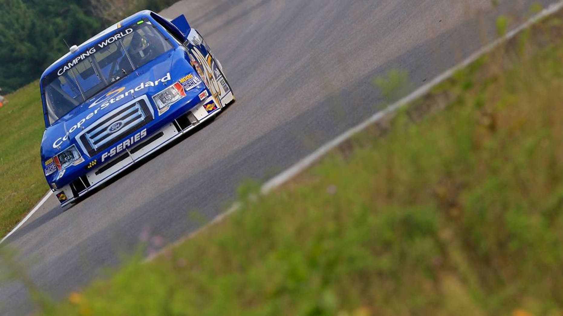 BOWMANVILLE, ON - AUGUST 30: Ryan Blaney, driver of the #29 Cooper Standard Ford, practices for the NASCAR Camping World Truck Series Chevrolet Silverado 250 at Canadian Tire Motorsport Park on August 30, 2013 in Bowmanville, Canada. (Photo by Geoff Burke/NASCAR via Getty Images)