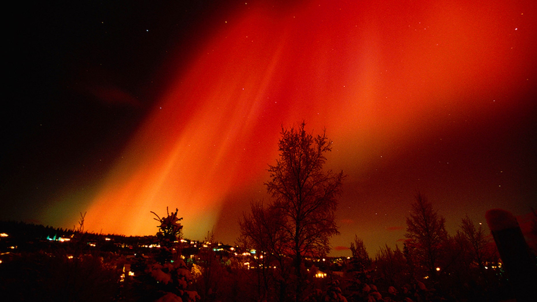 Red Aurora Over Hillside Residence Anchorage, Alaska, from February 2002