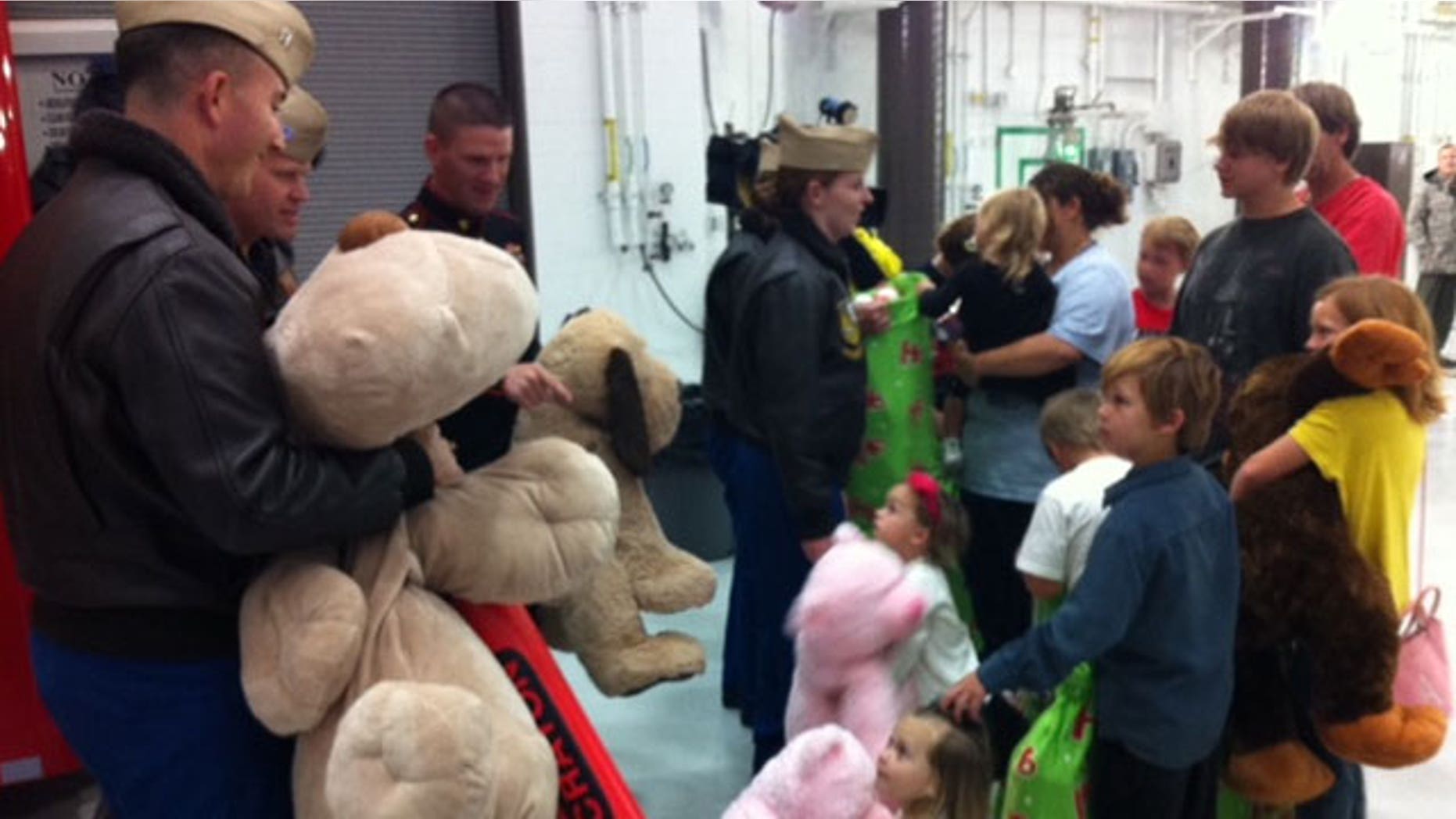Nov. 22, 2011: Blue Angels bring gifts to children displaced by tornadoes.