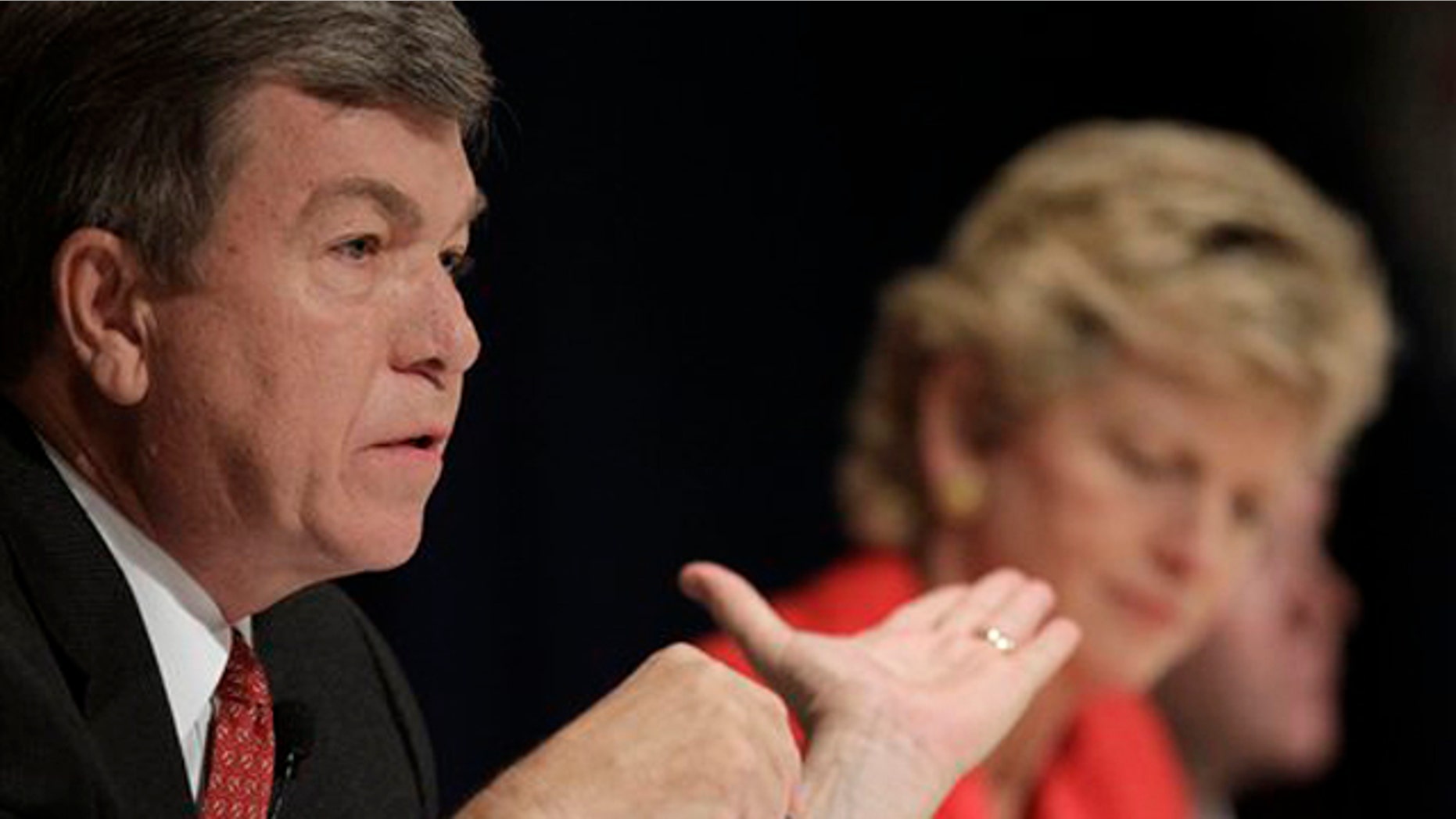 Republican Missouri Senate candidate Roy Blunt responds to Democratic candidate Robin Carnahan, right, during a debate Oct. 15 in Lake Ozark, Mo. (AP Photo)