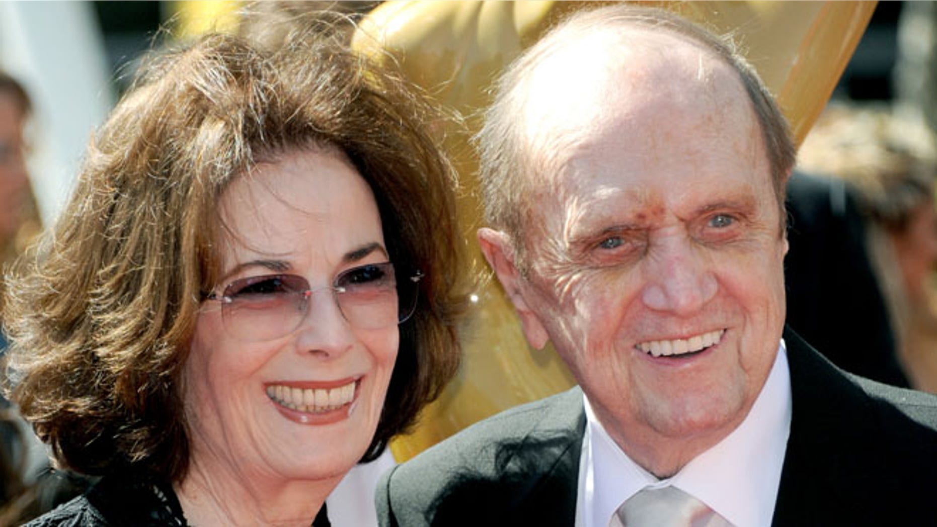Bob Newhart, right, and wife Ginny Newhart arrive at the Primetime Creative Arts Emmy Awards at the Nokia Theatre L.A. Live on Sunday, Sept. 15, 2013, in Los Angeles. (Photo by Richard Shotwell/Invision/AP)