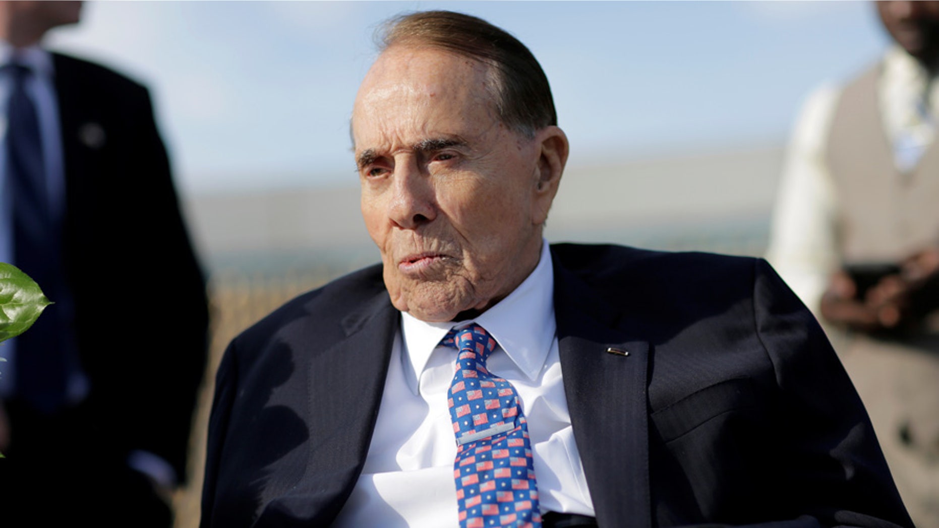 World War Two veteran and former Senate Majority Leader Bob Dole attends Memorial day services at the World War II Memorial in Washington, U.S., November 11, 2016. REUTERS/Joshua Roberts - S1AEUMGVXDAA